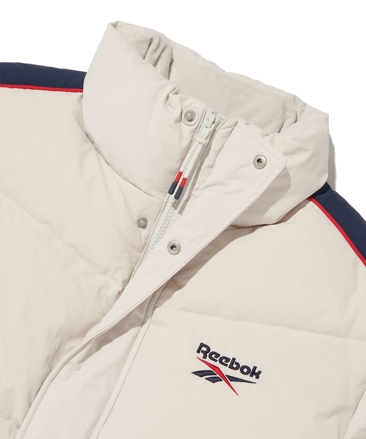 리복(REEBOK) 클래식 벡터 패널드 다운 자켓 - 베이지