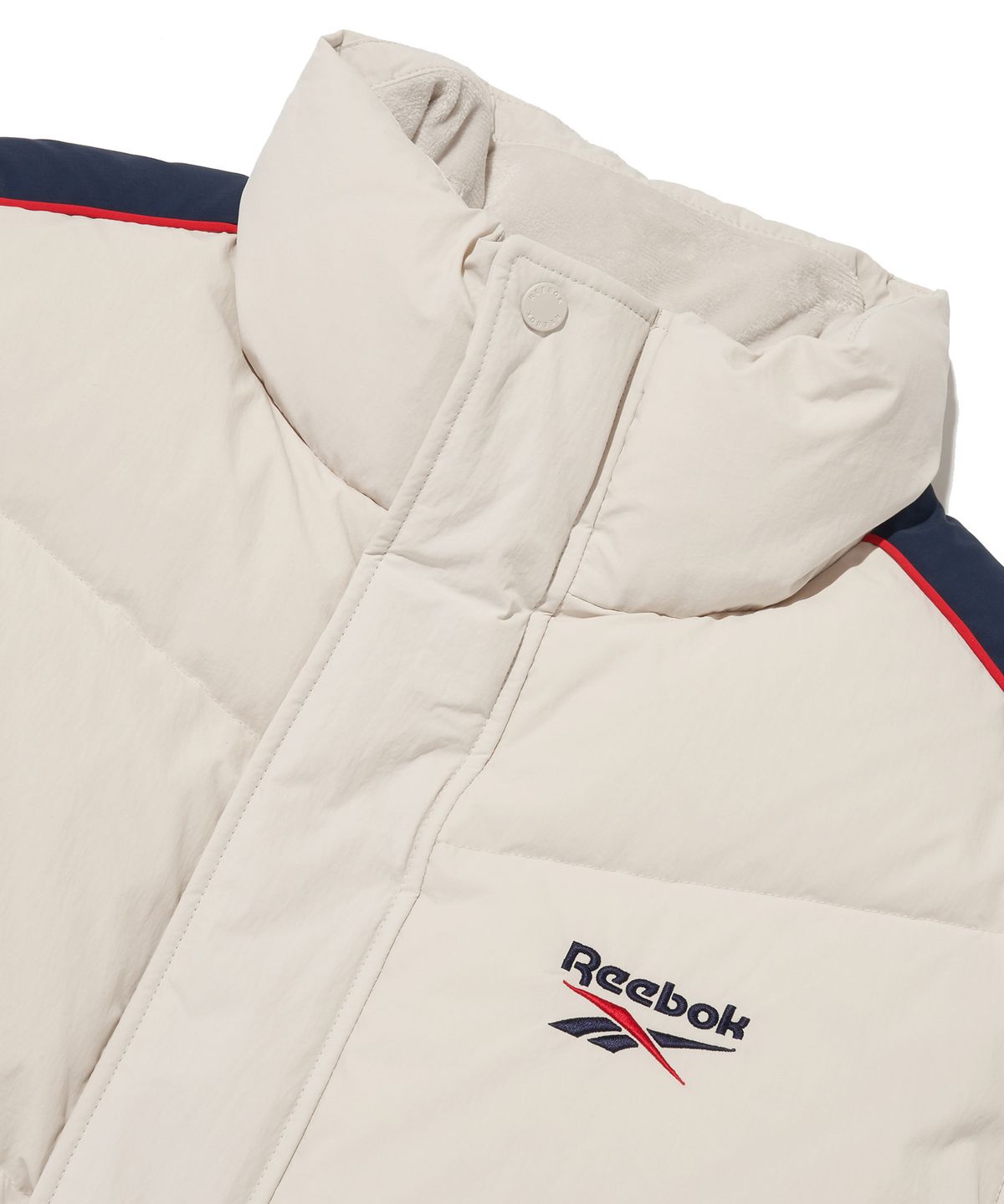 리복(REEBOK) 클래식 벡터 패널드 다운 자켓 - 베이지