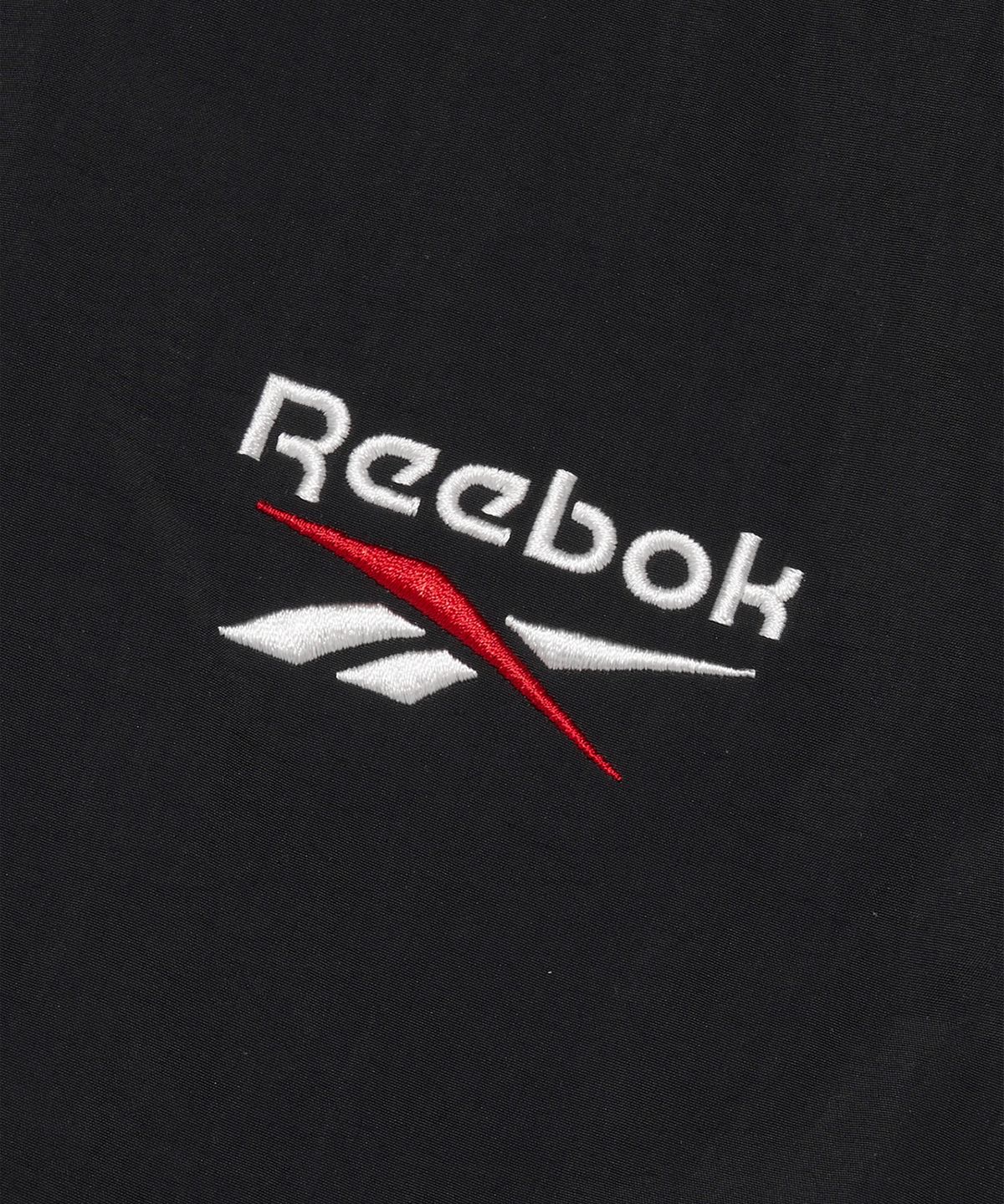 리복(REEBOK) 벡터 벤치 코트 - 블랙