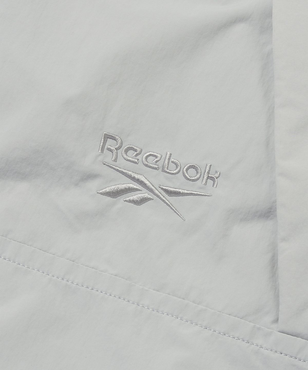 리복(REEBOK) 스포츠 롱 다운 파카 - 그레이
