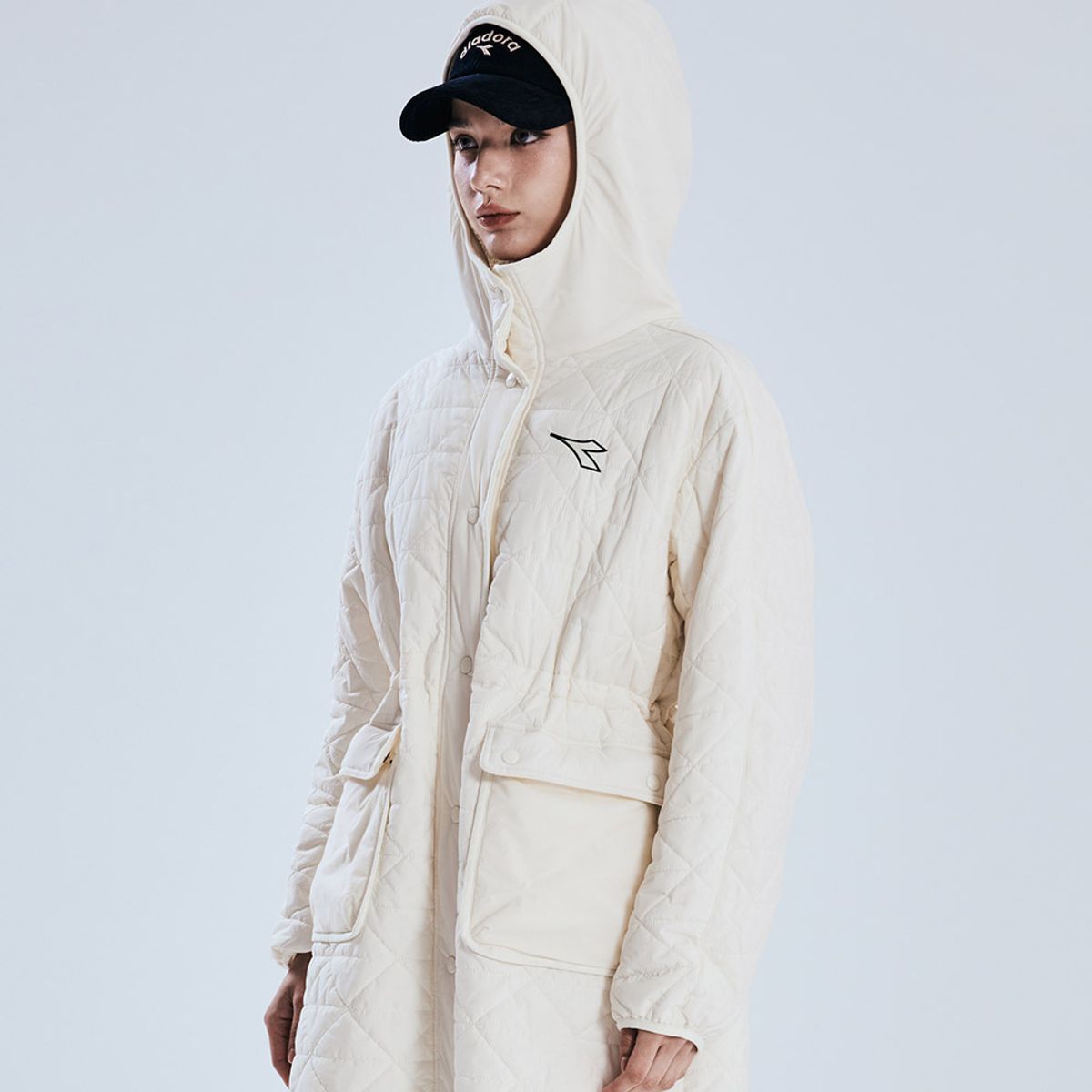 디아도라(diadora) 벤치 플리스 롱패딩 자켓 IVORY