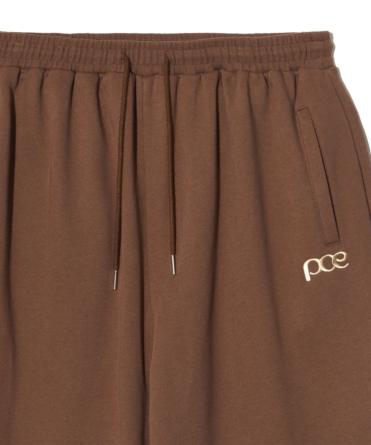피스메이커(PIECE MAKER) PCE POCKET APPLIQUE SWEAT PANTS (BROWN)