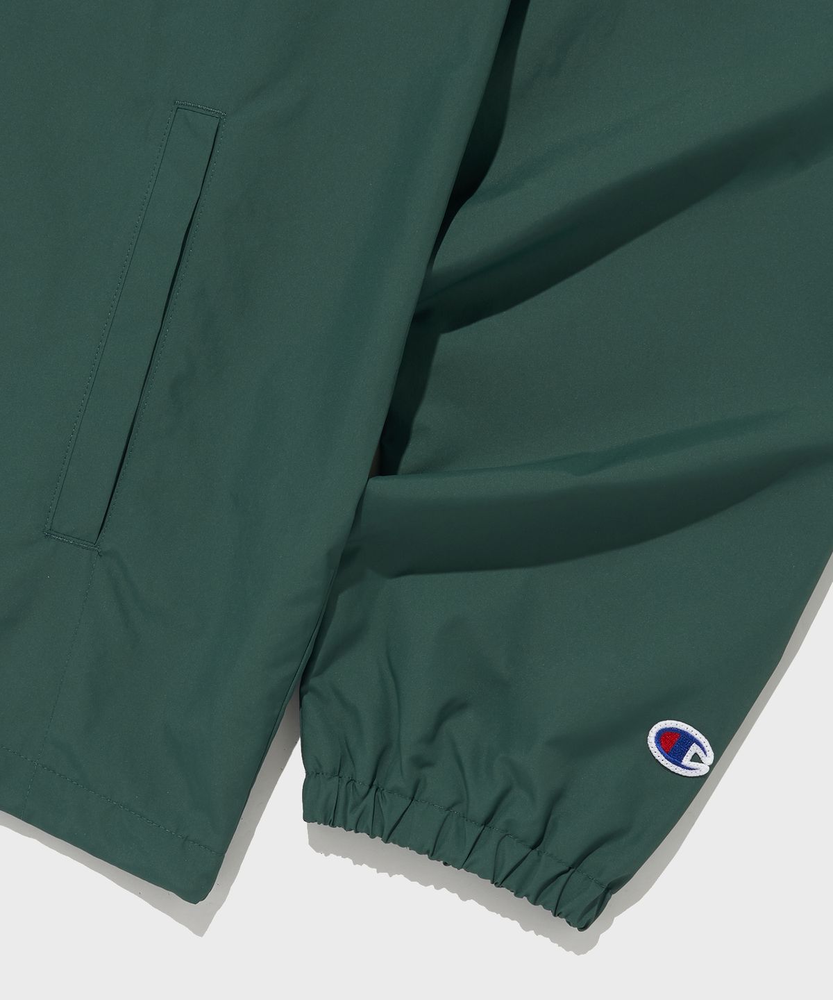 챔피온(CHAMPION) 폴리에스터 메쉬 안감 코치 재킷 Dark Green