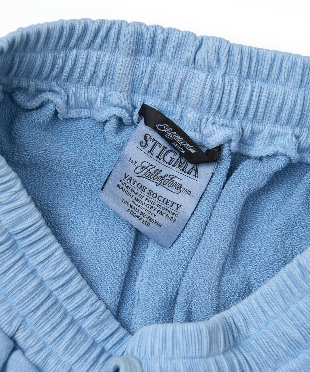 스티그마(STIGMA) Applique STGM Pigment Washed Wide Jogger Pants Sky Blue