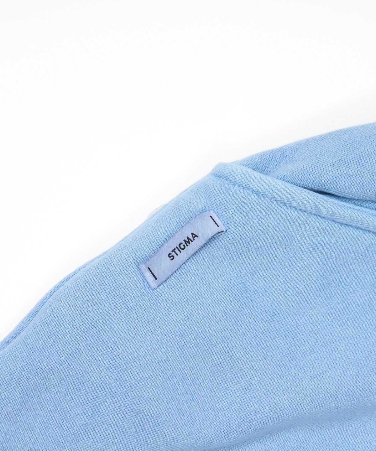스티그마(STIGMA) Applique STGM Pigment Washed Wide Jogger Pants Sky Blue