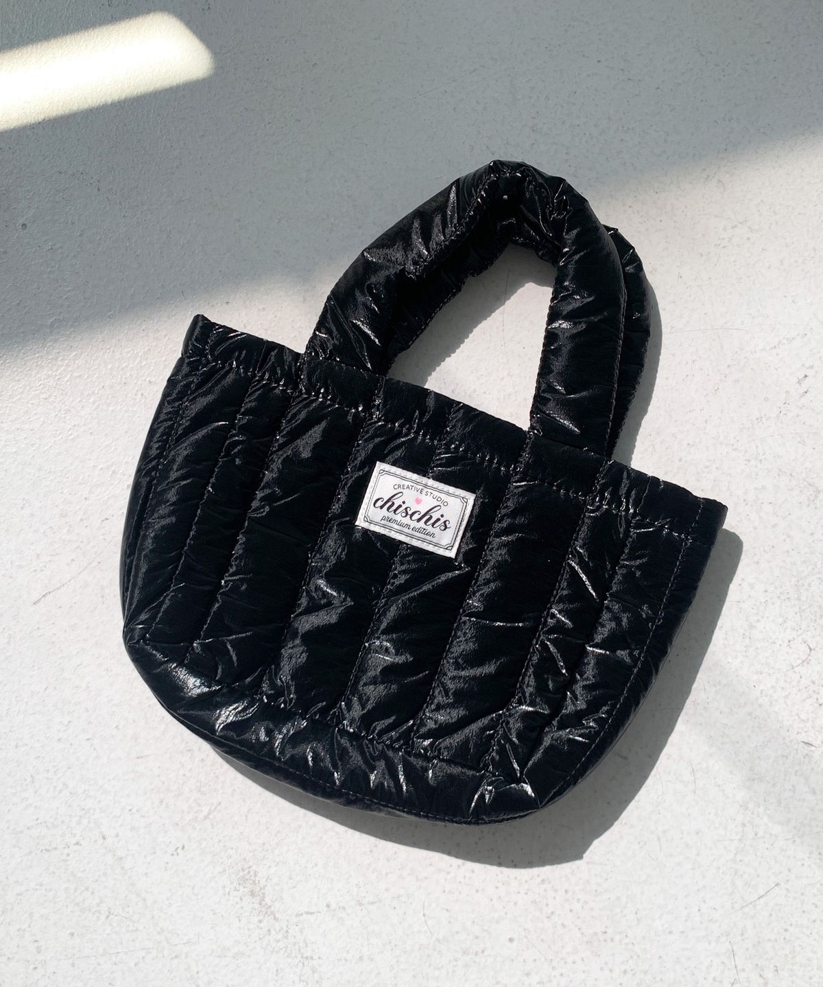 치스치스(CHISCHIS) CHISCHIS PADDING BAG - BLACK