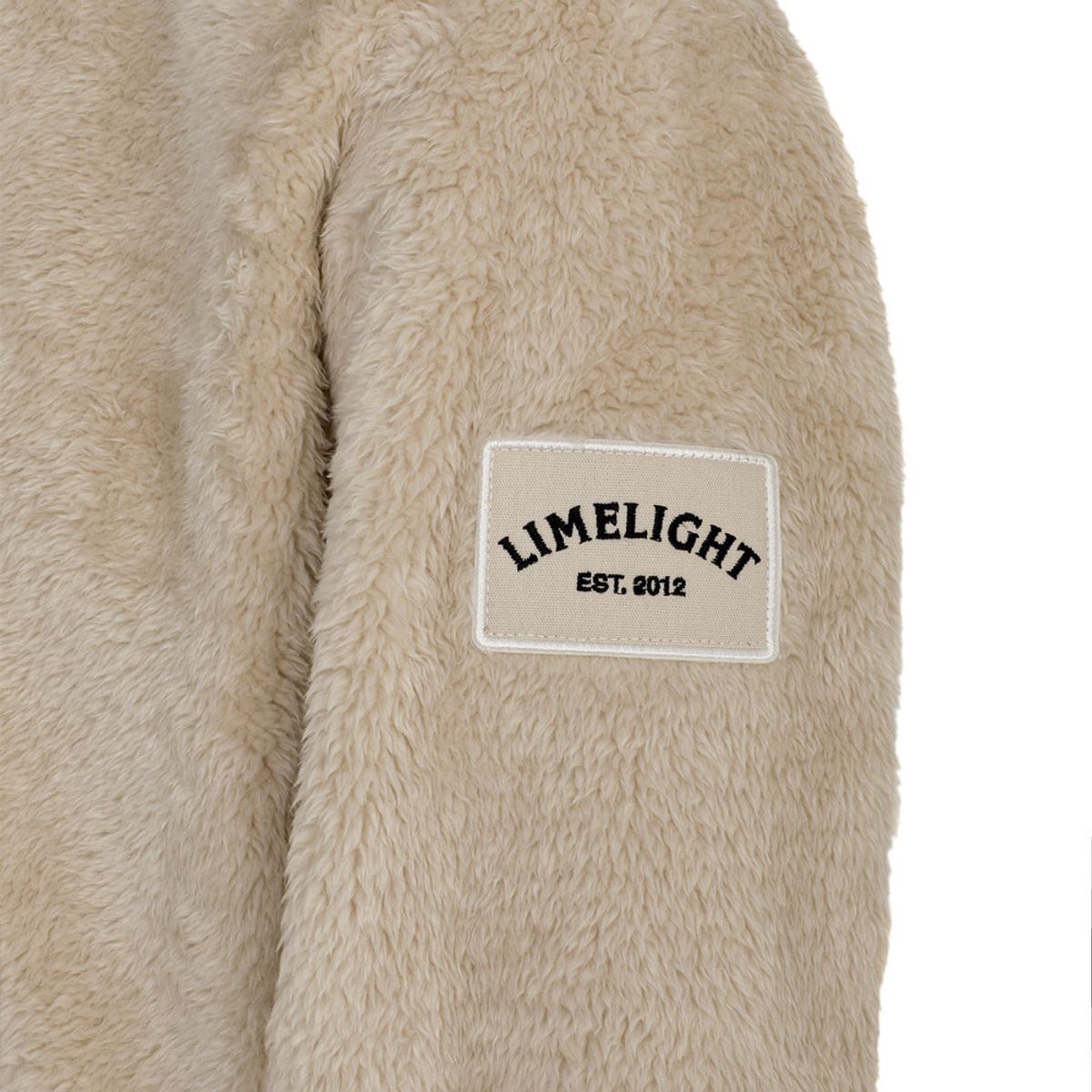 라임라잇 어패럴(LIMELIGHT APPAREL) 애슬릿 아치 로고 와펜 플리스 자켓 (샌드)