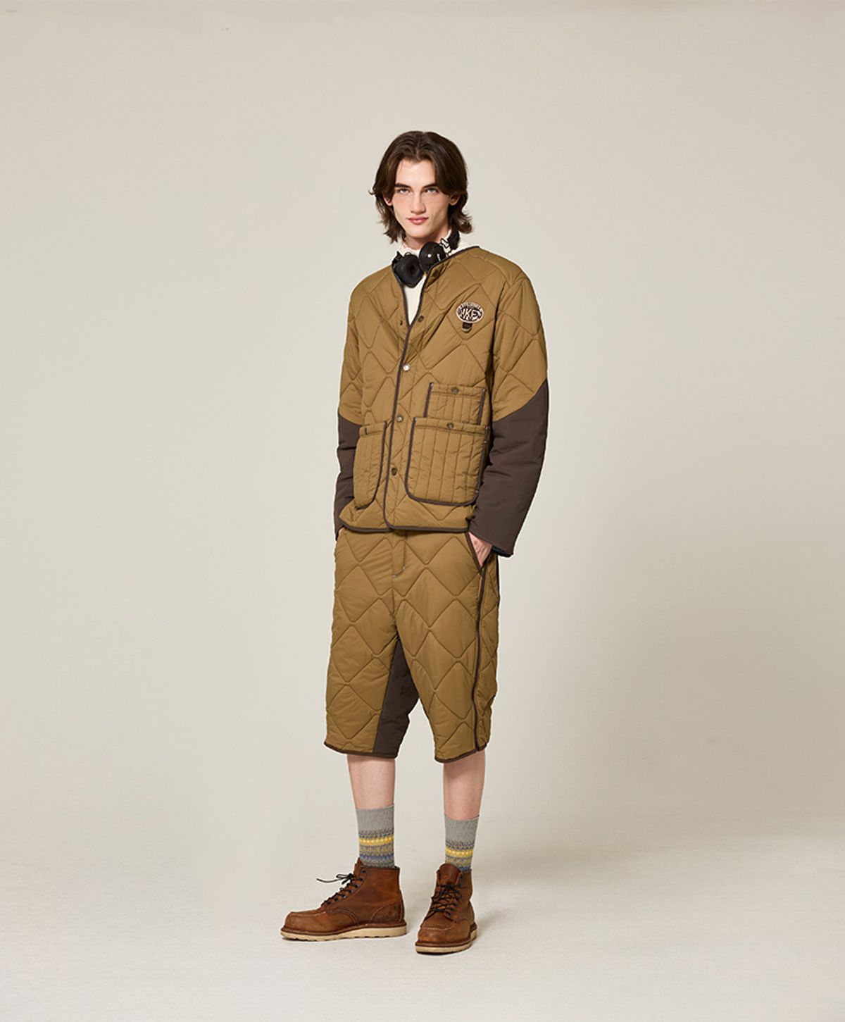 누크피터(NUUKFITTER) AERO LOGO PATCHED PADDING JUMPER [BEIGE]