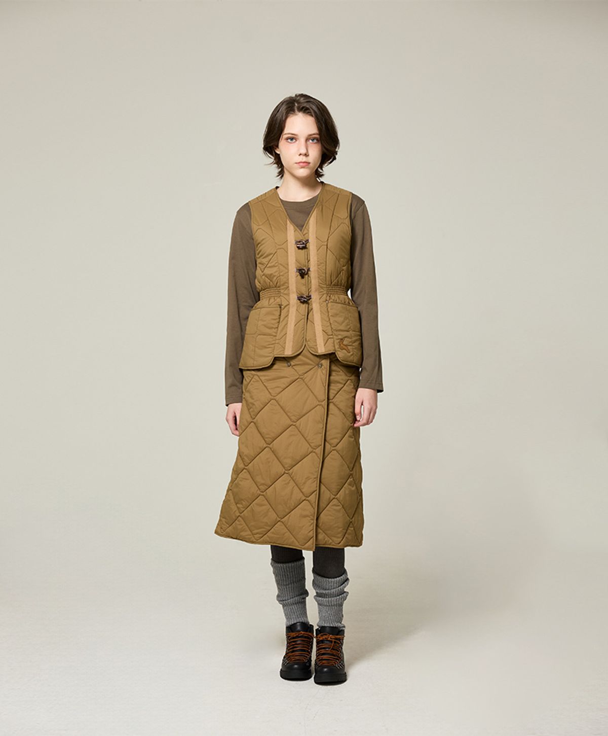 누크피터(NUUKFITTER) AERO SNAP PADDING WRAP SKIRT_WOMEN [BEIGE]