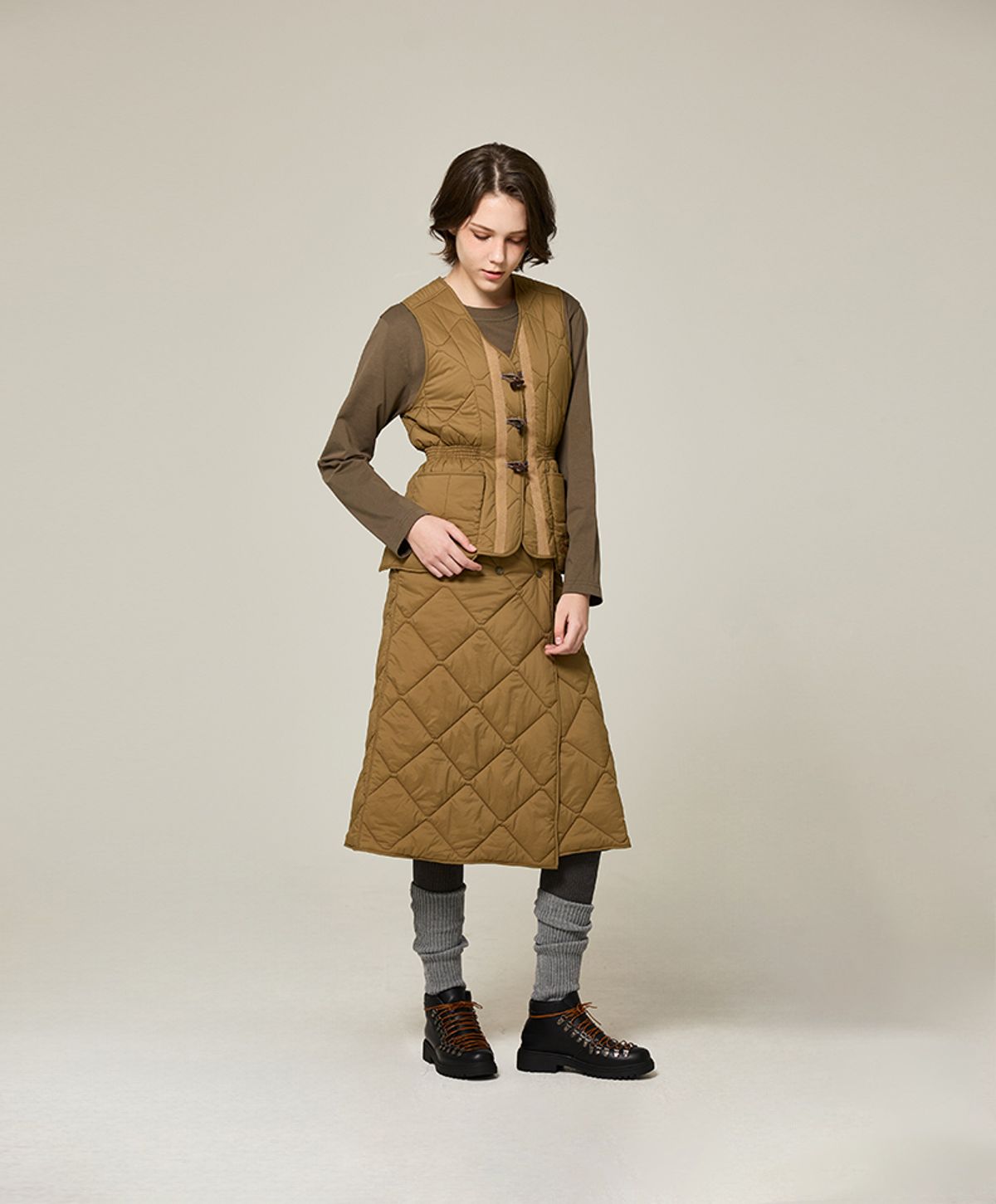 누크피터(NUUKFITTER) AERO SNAP PADDING WRAP SKIRT_WOMEN [BEIGE]