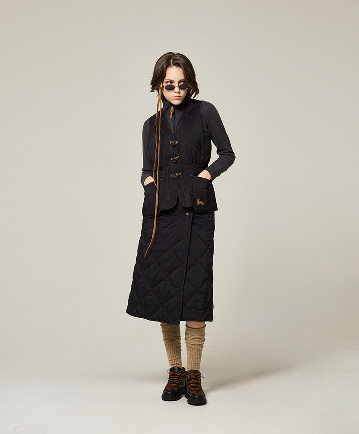누크피터(NUUKFITTER) AERO SNAP PADDING WRAP SKIRT_WOMEN [BLACK]