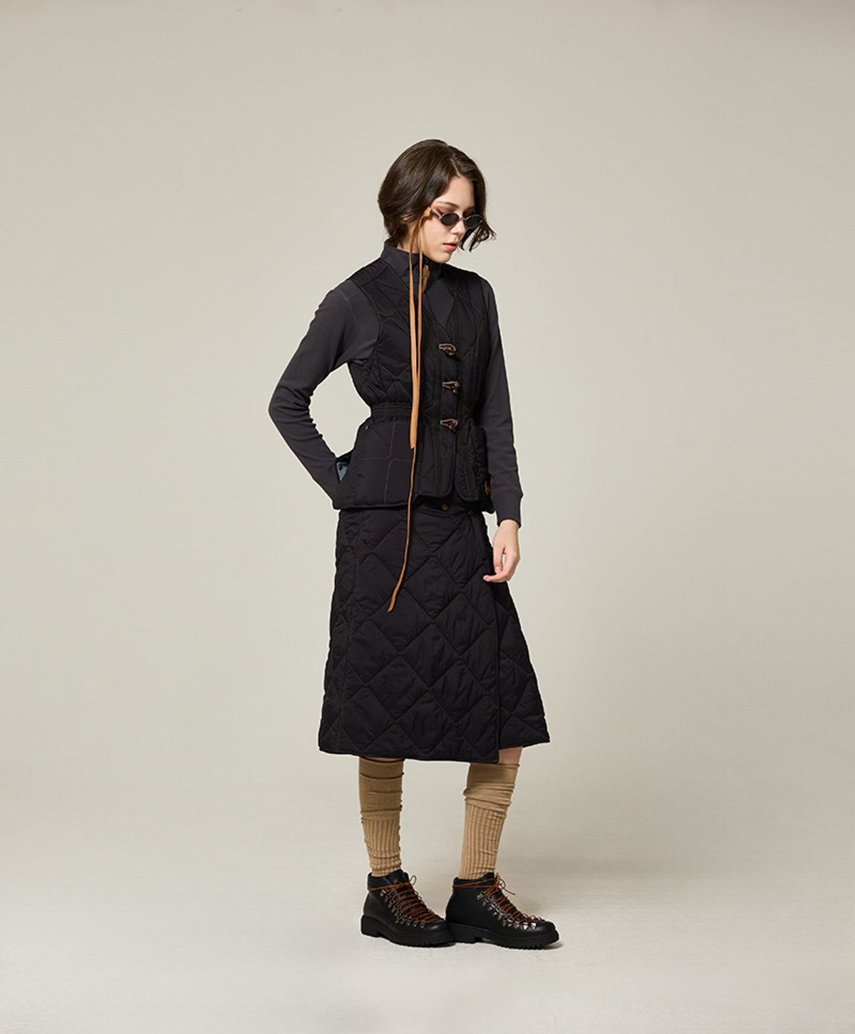 누크피터(NUUKFITTER) AERO SNAP PADDING WRAP SKIRT_WOMEN [BLACK]
