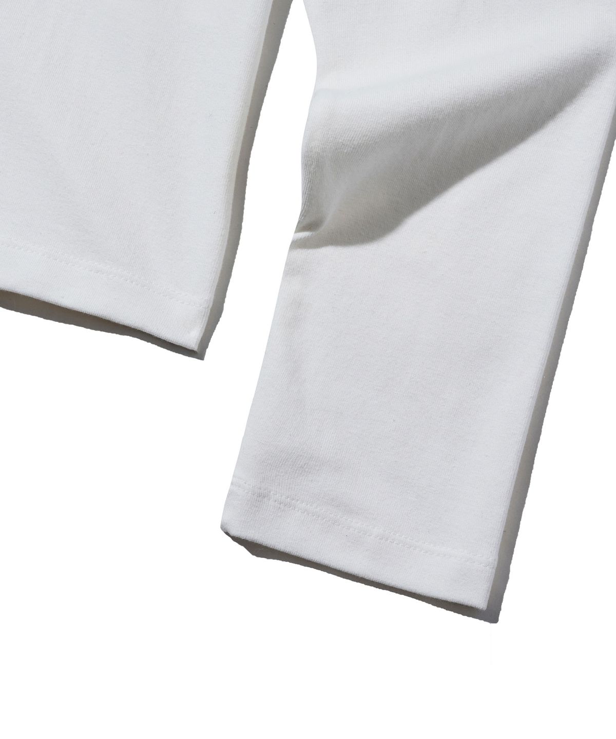 브라운브레스(BROWNBREATH) W TAG SPAN LONGSLEEVE - OFF WHITE