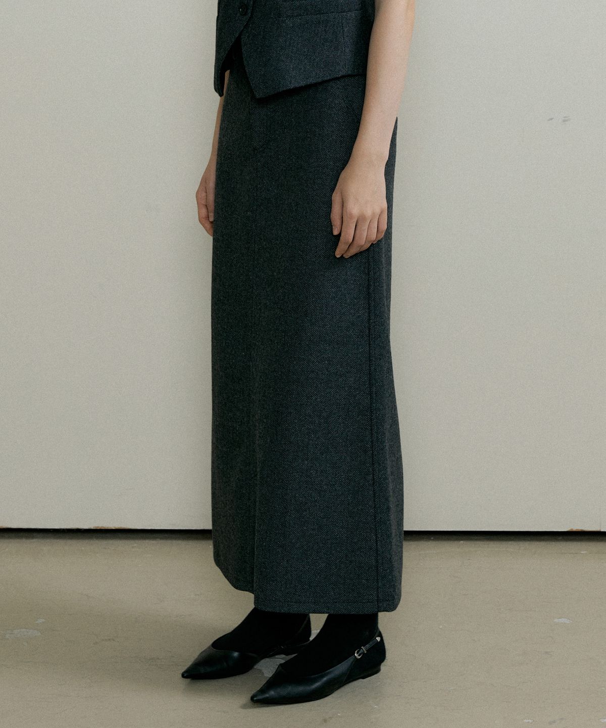 더페니(THE PENNY) WOOL HERRINGBONE LONG SKIRT - Charcoal