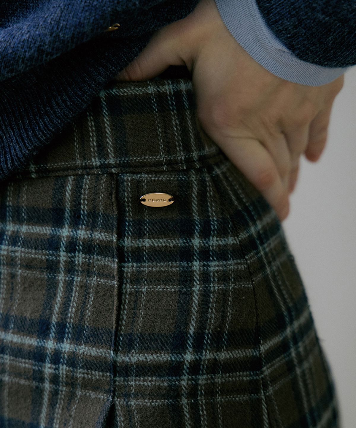 리올그(REORG) EOT CHECKERED PLEATS MINI SKIRT BROWN