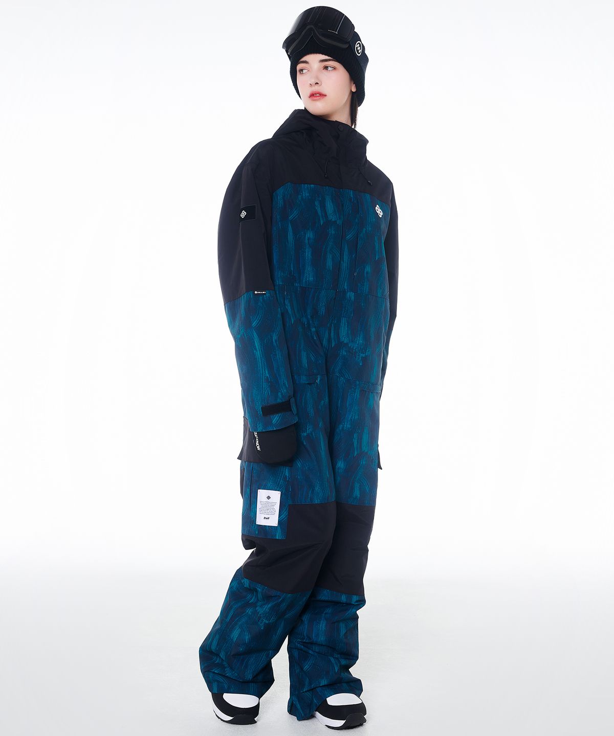 돌아우터웨어(DOLL OUTERWEAR) 2425 리브레 보드복 점프슈트 그린 프린트 남녀공용