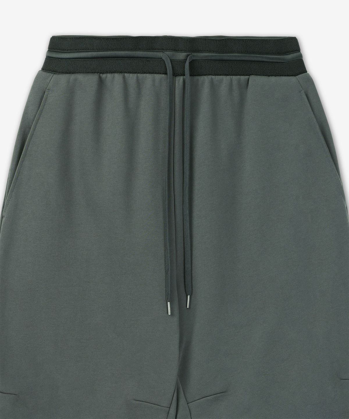 헬무트 랭(HELMUT LANG) 커브 스웨트 조거 팬츠 - 블랙 샌드 / O07HM20122n