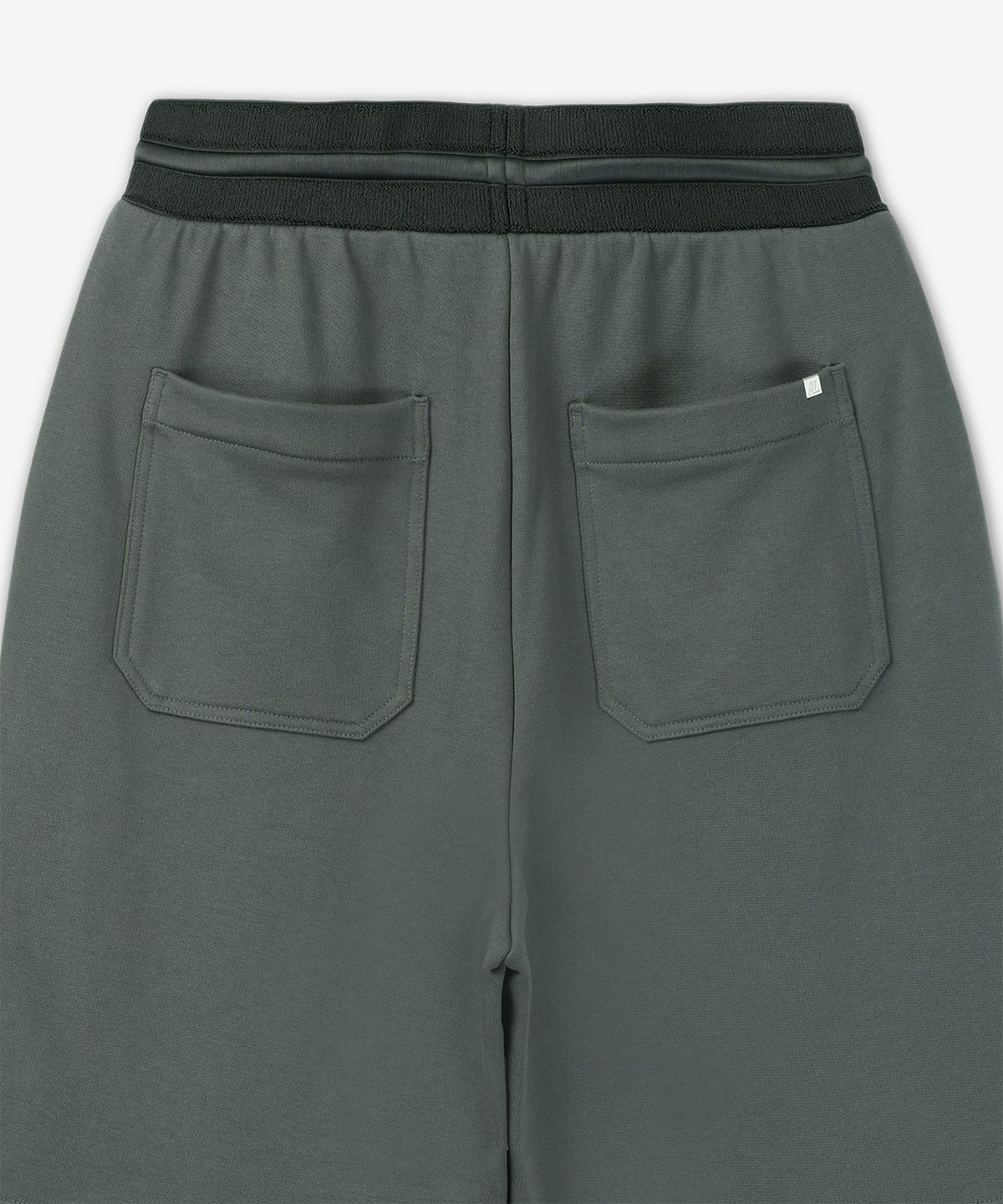헬무트 랭(HELMUT LANG) 커브 스웨트 조거 팬츠 - 블랙 샌드 / O07HM20122n