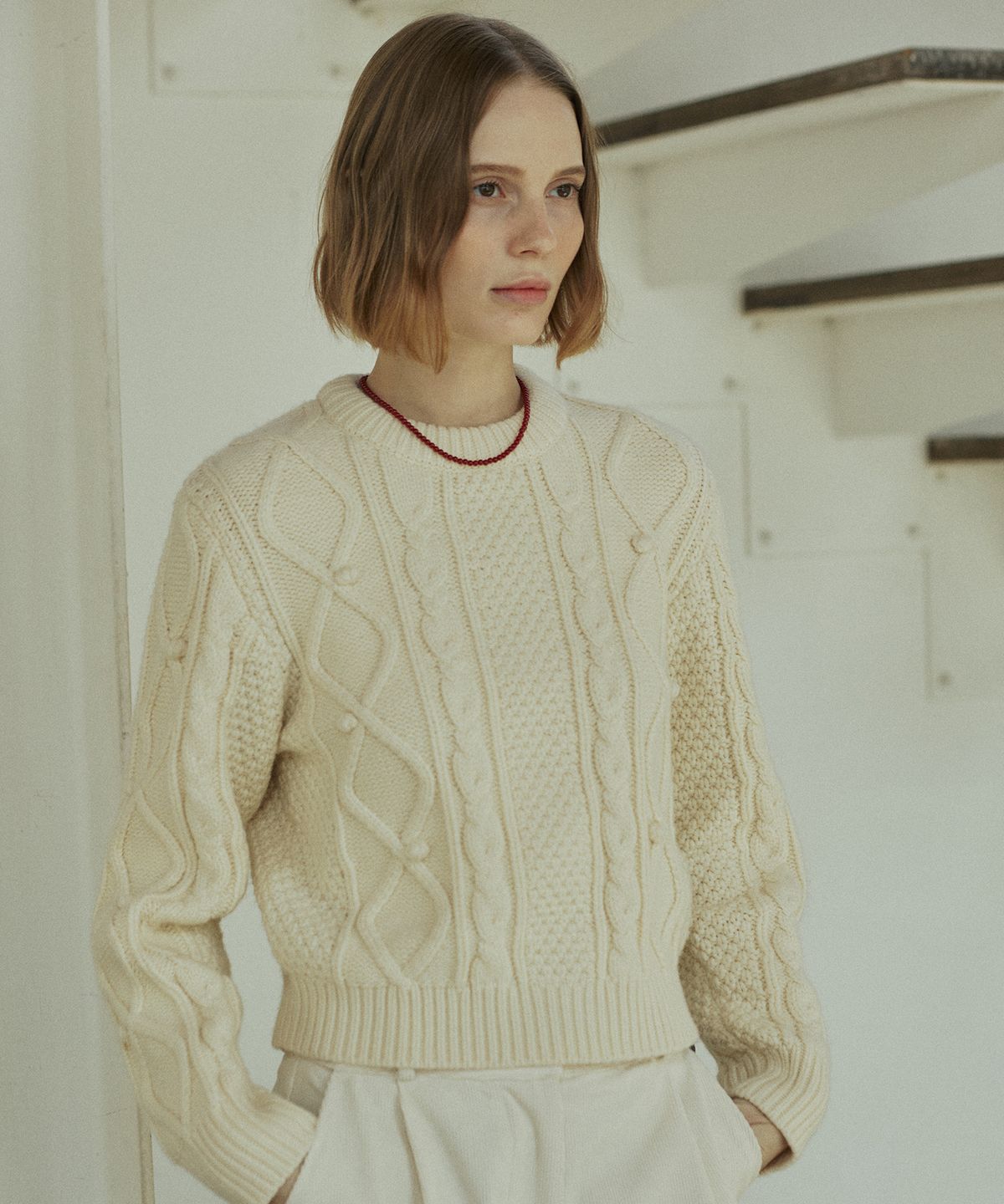 엽페(YUPPE) BELL CABLE KNIT_CREAM