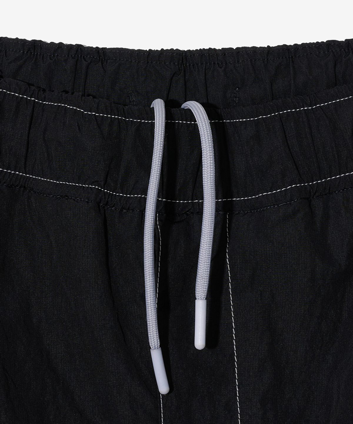 논타입(NONTYPE) CURVED STITCH PADDED PARKA PANTS (BLACK)