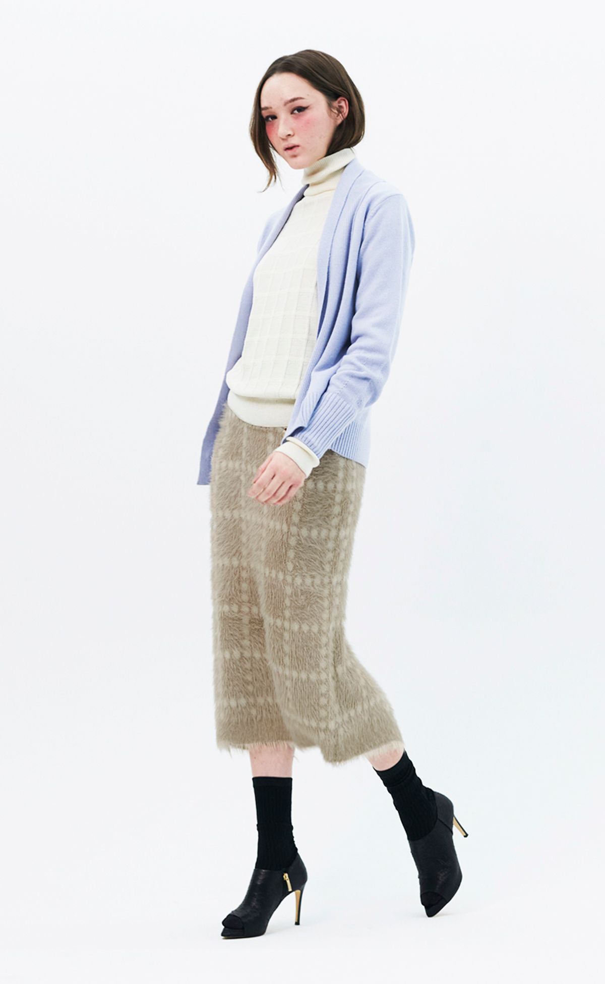 로희어패럴(ROHEE APPAREL) 소프트 장모 체크 자카드 니트 스커트 / 베이지