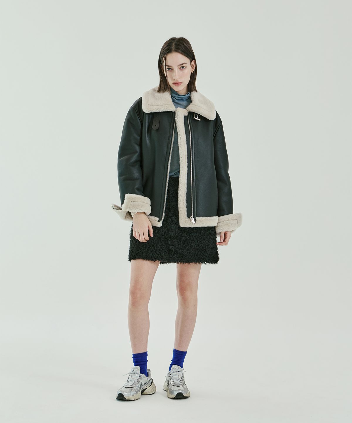 핀블랙(PINBLACK) 라콘 테디 무스탕 스커트 블랙