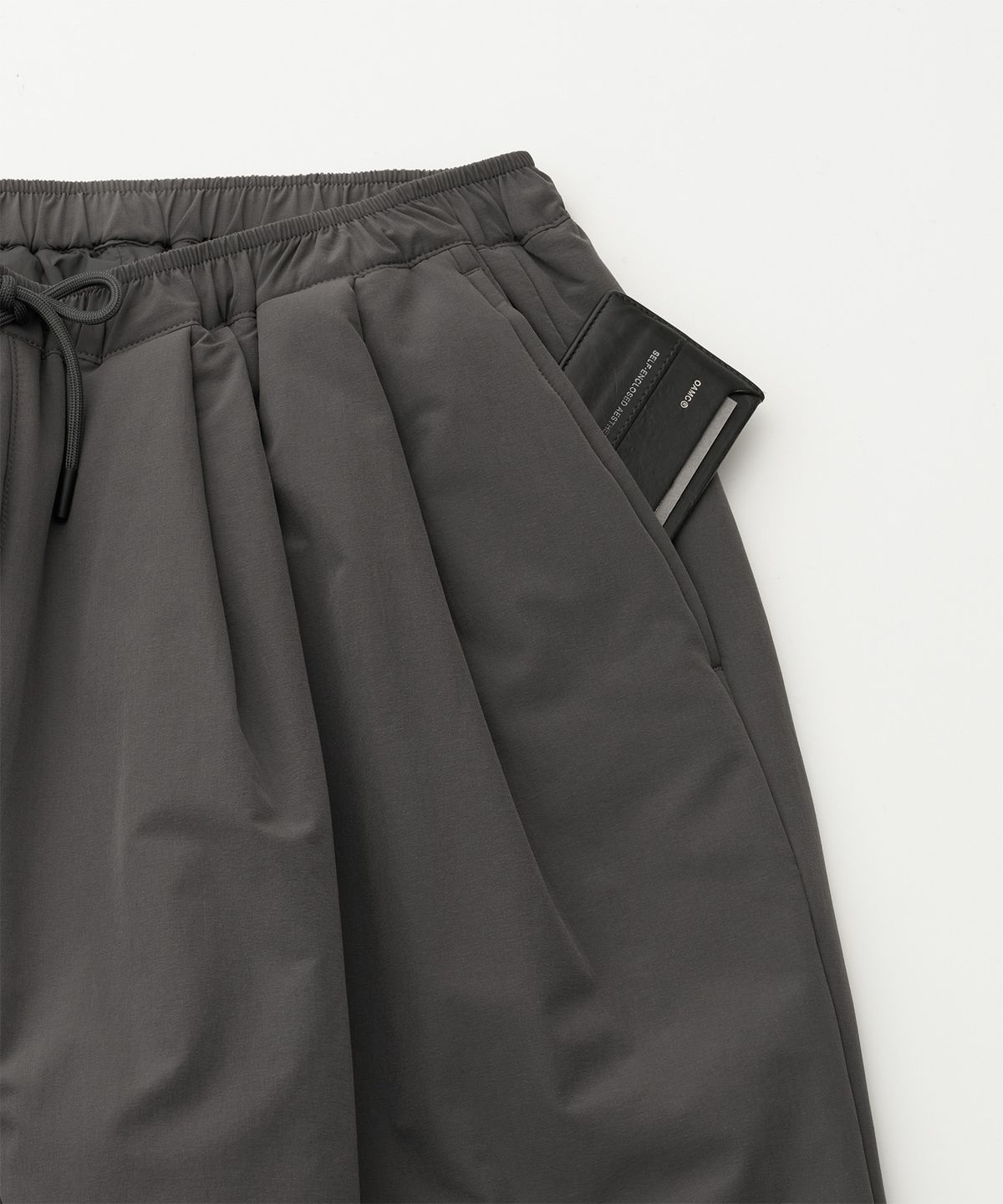 어나더 오피스(ANOTHER OFFICE) Ample Insulation Pants (Gray)