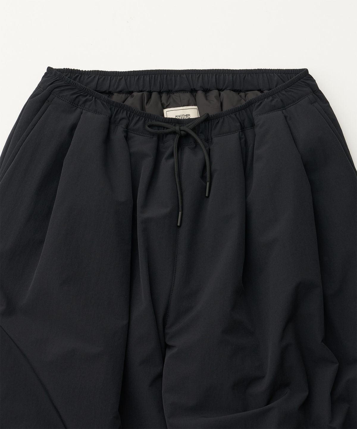 어나더 오피스(ANOTHER OFFICE) Ample Insulation Pants (Black)