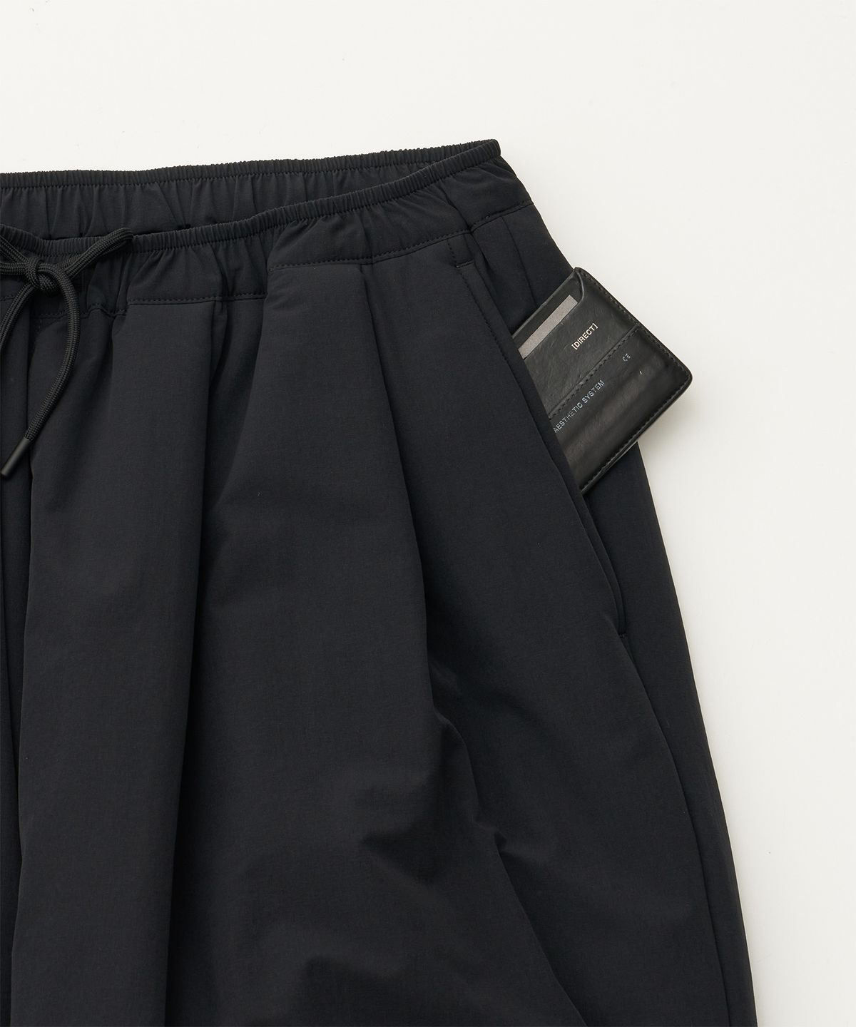 어나더 오피스(ANOTHER OFFICE) Ample Insulation Pants (Black)