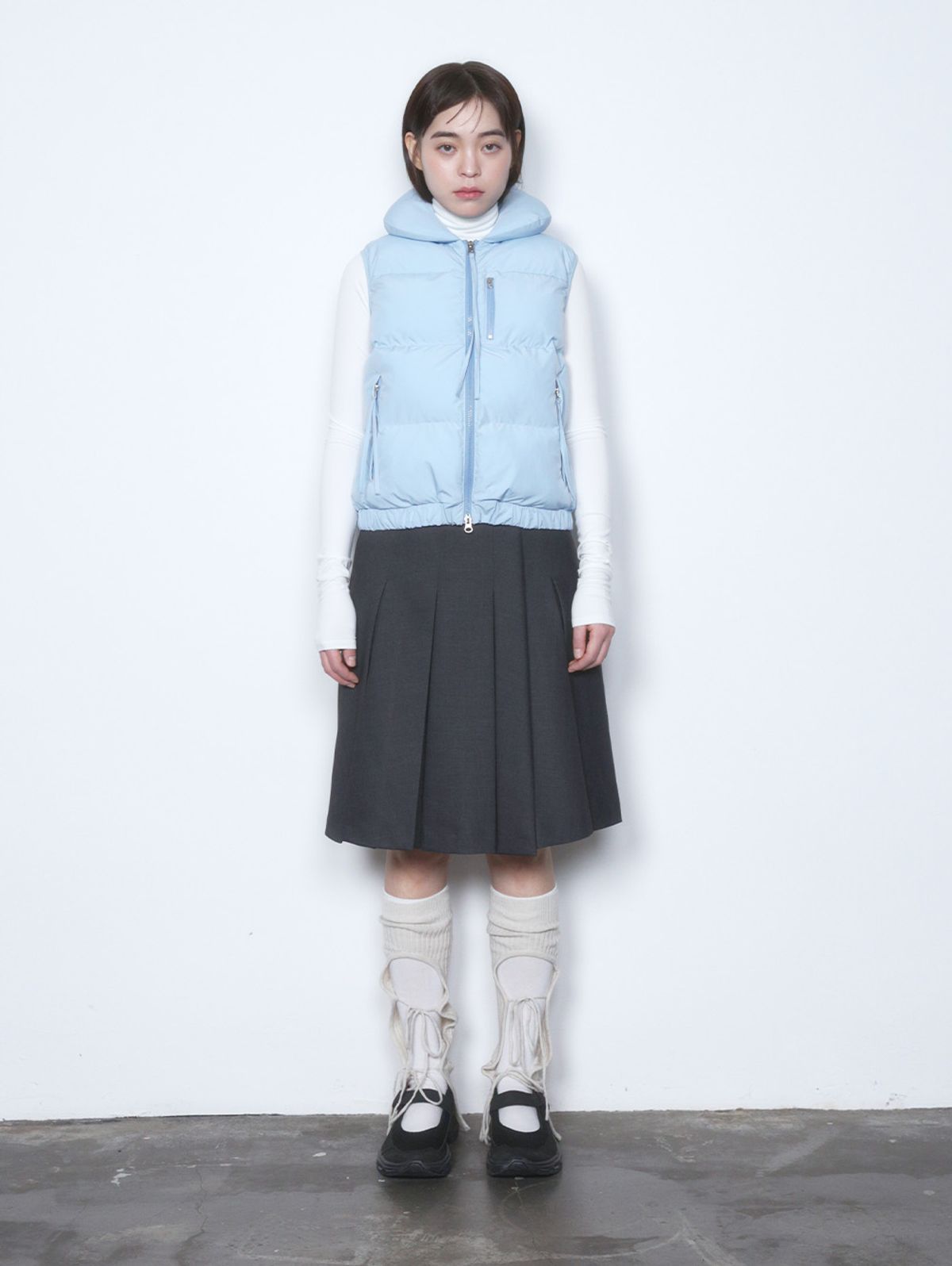 뚜오미오(TUOMIO) STRAP PUFFER VEST [BABY BLUE]