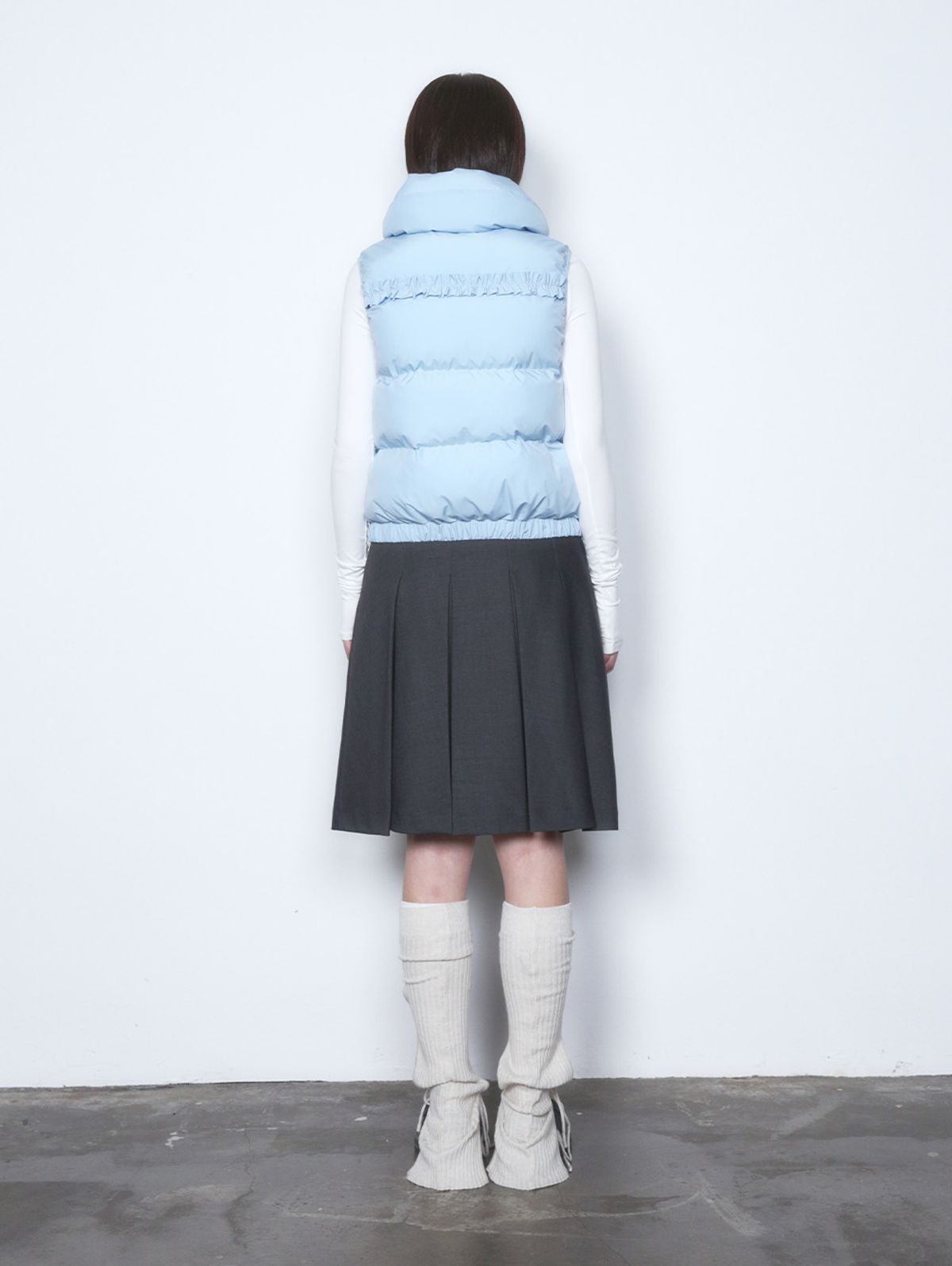뚜오미오(TUOMIO) STRAP PUFFER VEST [BABY BLUE]