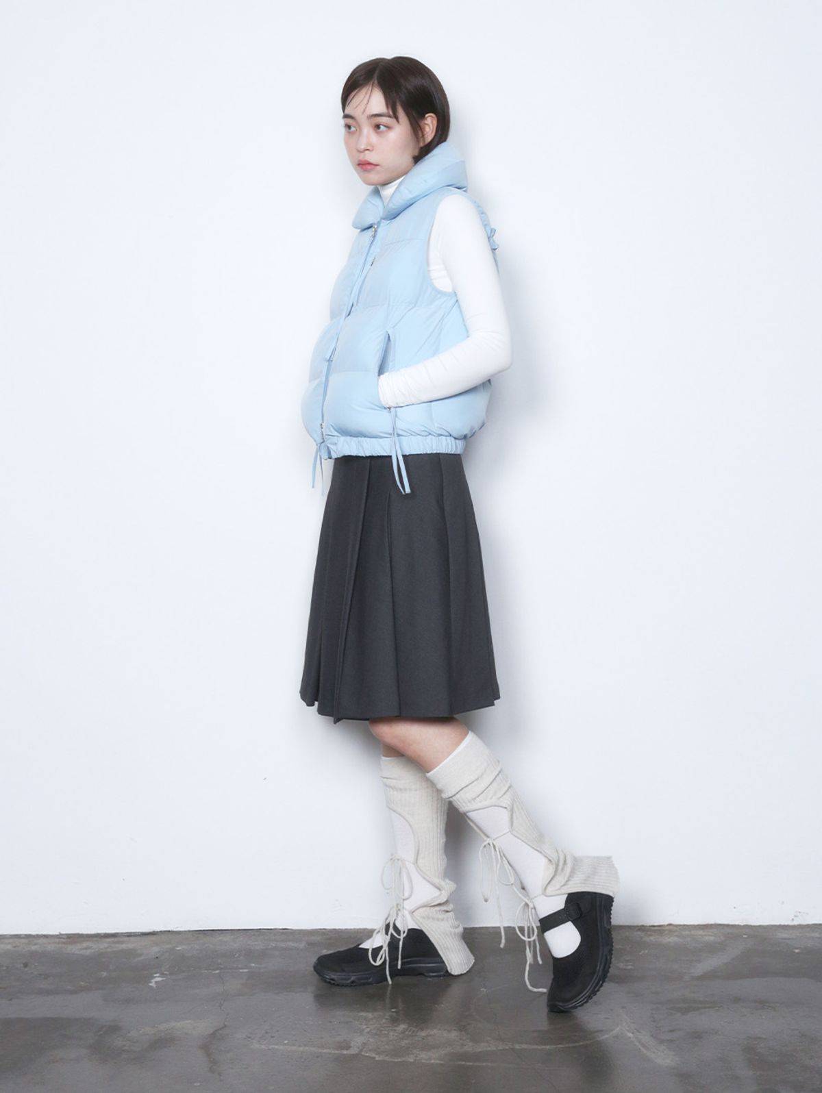 뚜오미오(TUOMIO) STRAP PUFFER VEST [BABY BLUE]