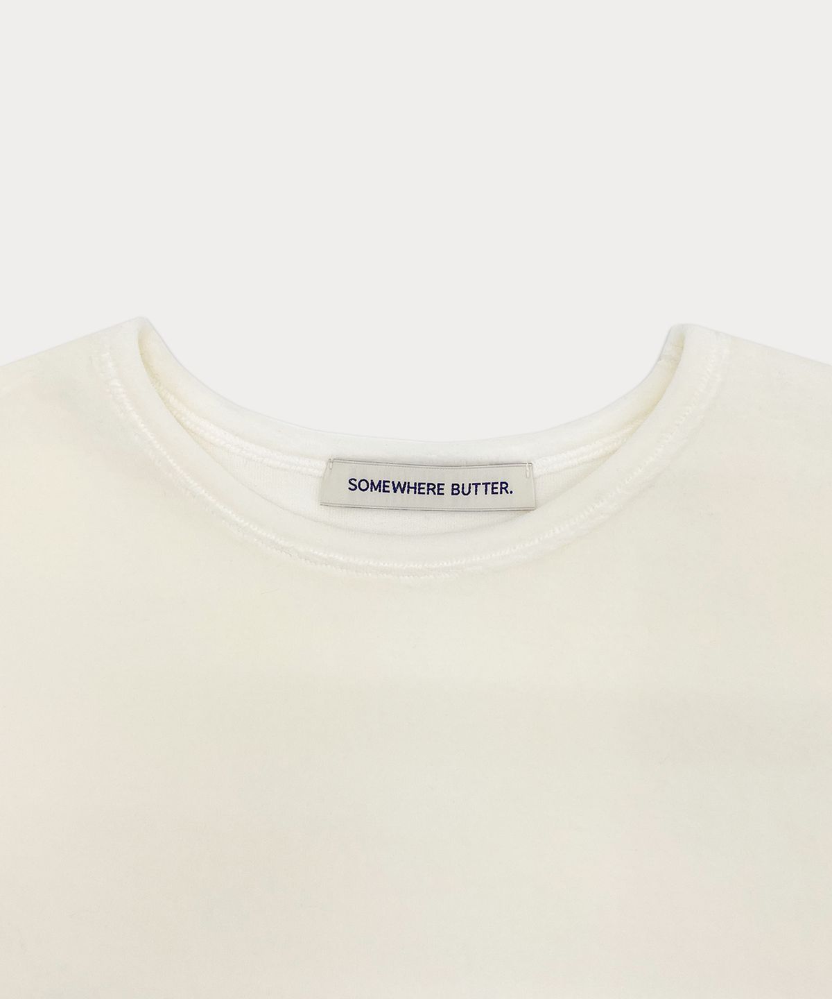 썸웨어버터(SOMEWHEREBUTTER) Velour Lettering Top - Ivory