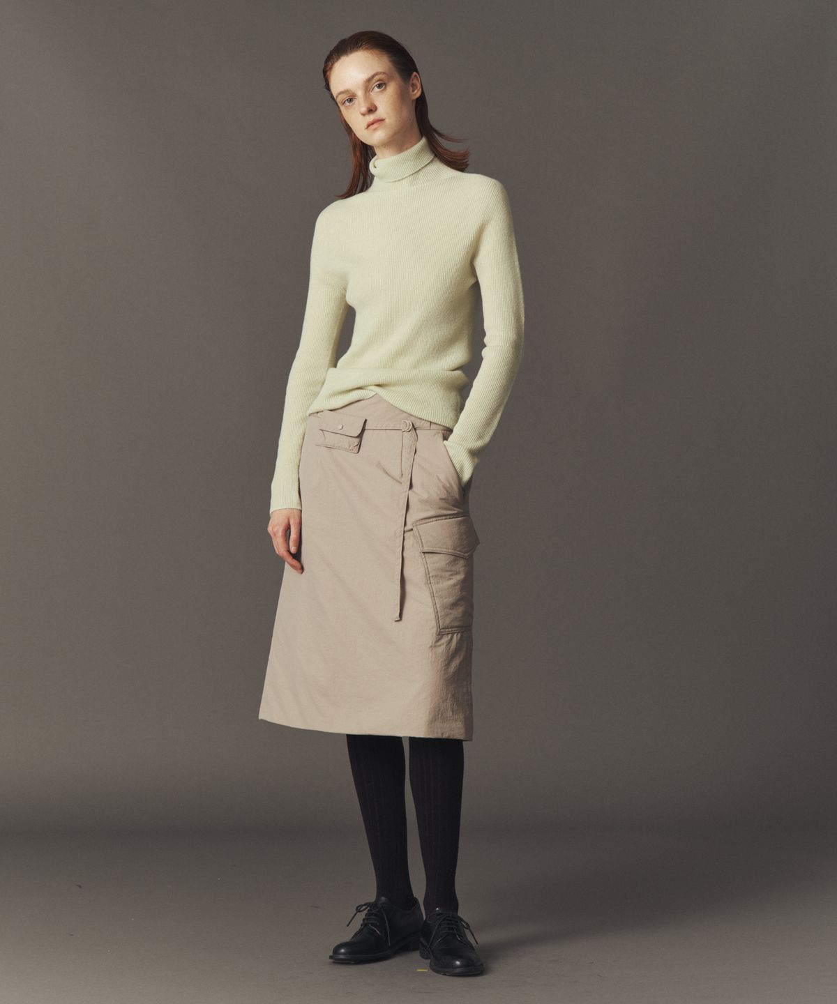 아위(AHWE) SOFT PUFFER SKIRT_P BEIGE