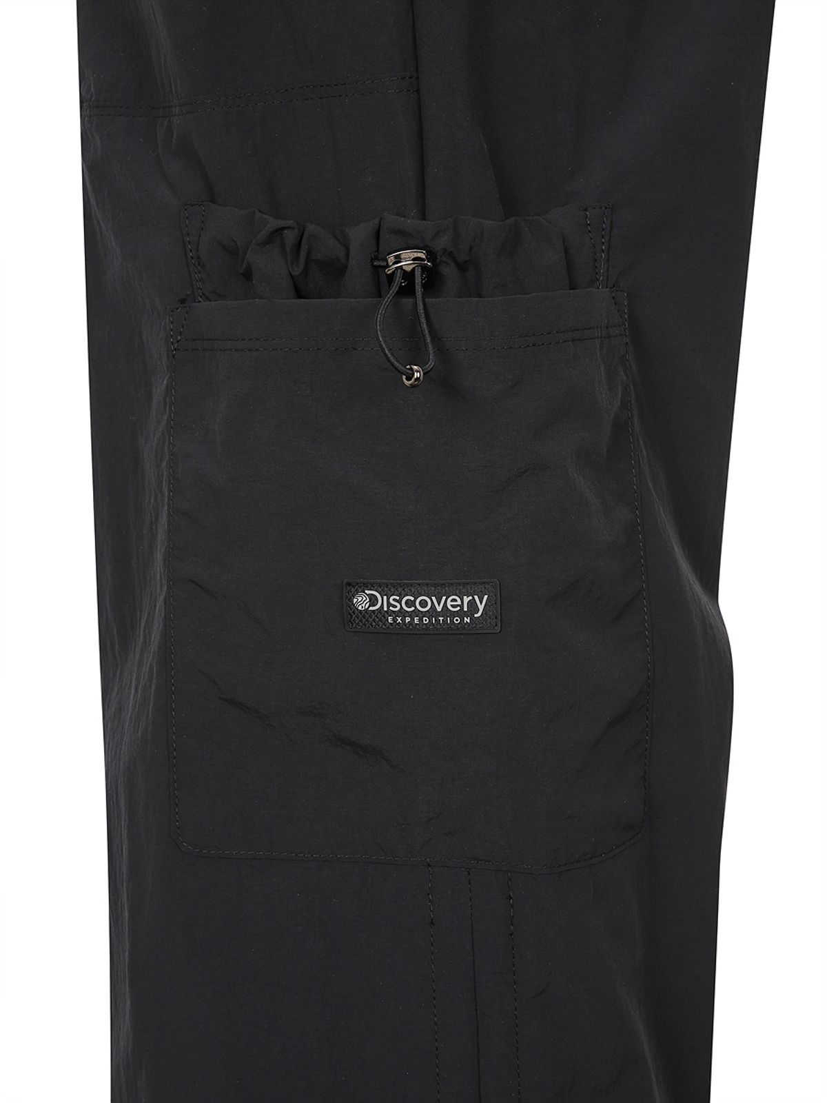 디스커버리 익스페디션(DISCOVERY EXPEDITION) 프레시벤트 여성 스트링 파라슈트 카고팬츠 (BLACK)