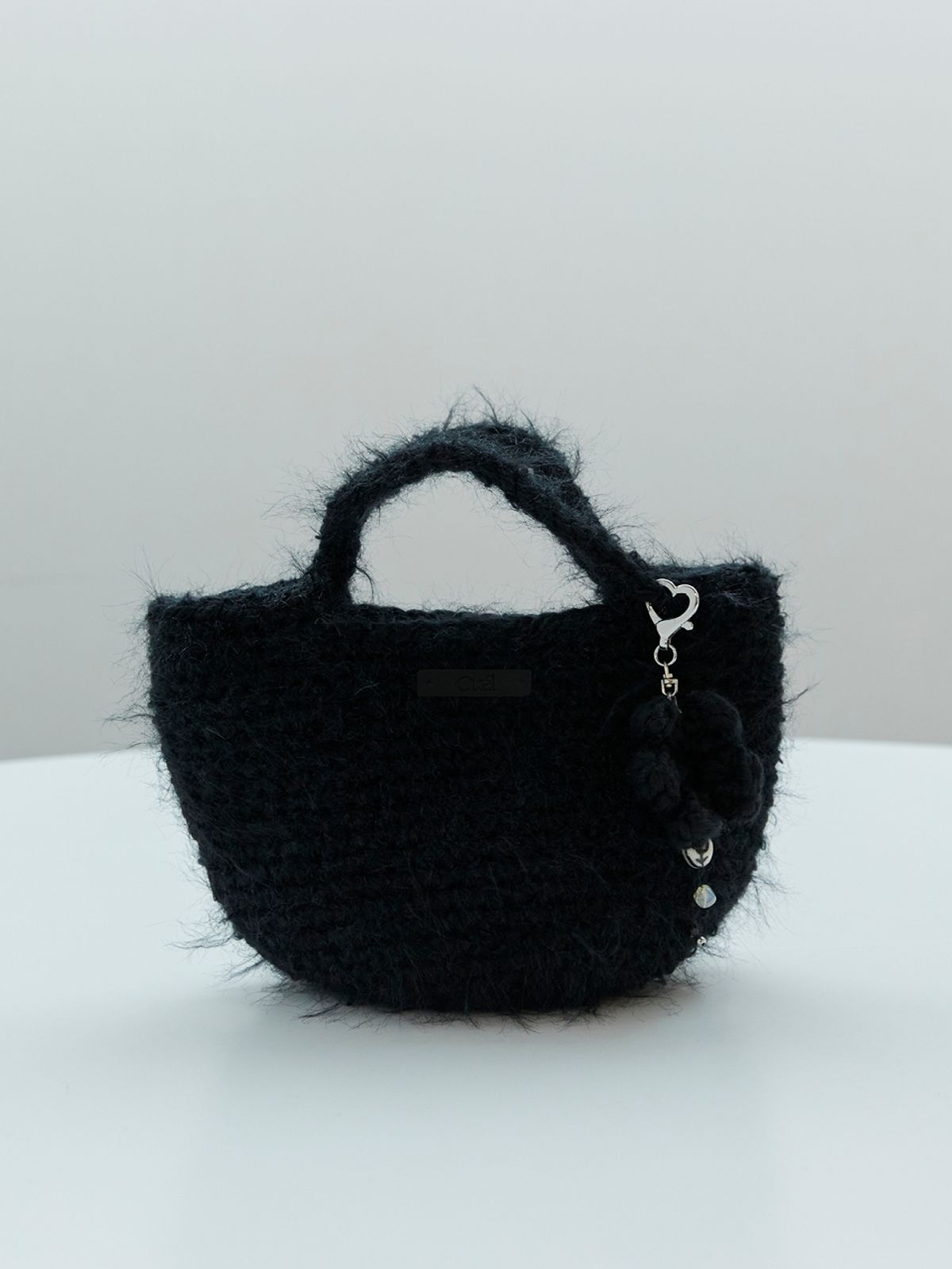 오앨(OUEL) HANDMADE BOUCLE KNIT MINI BAG_BLACK