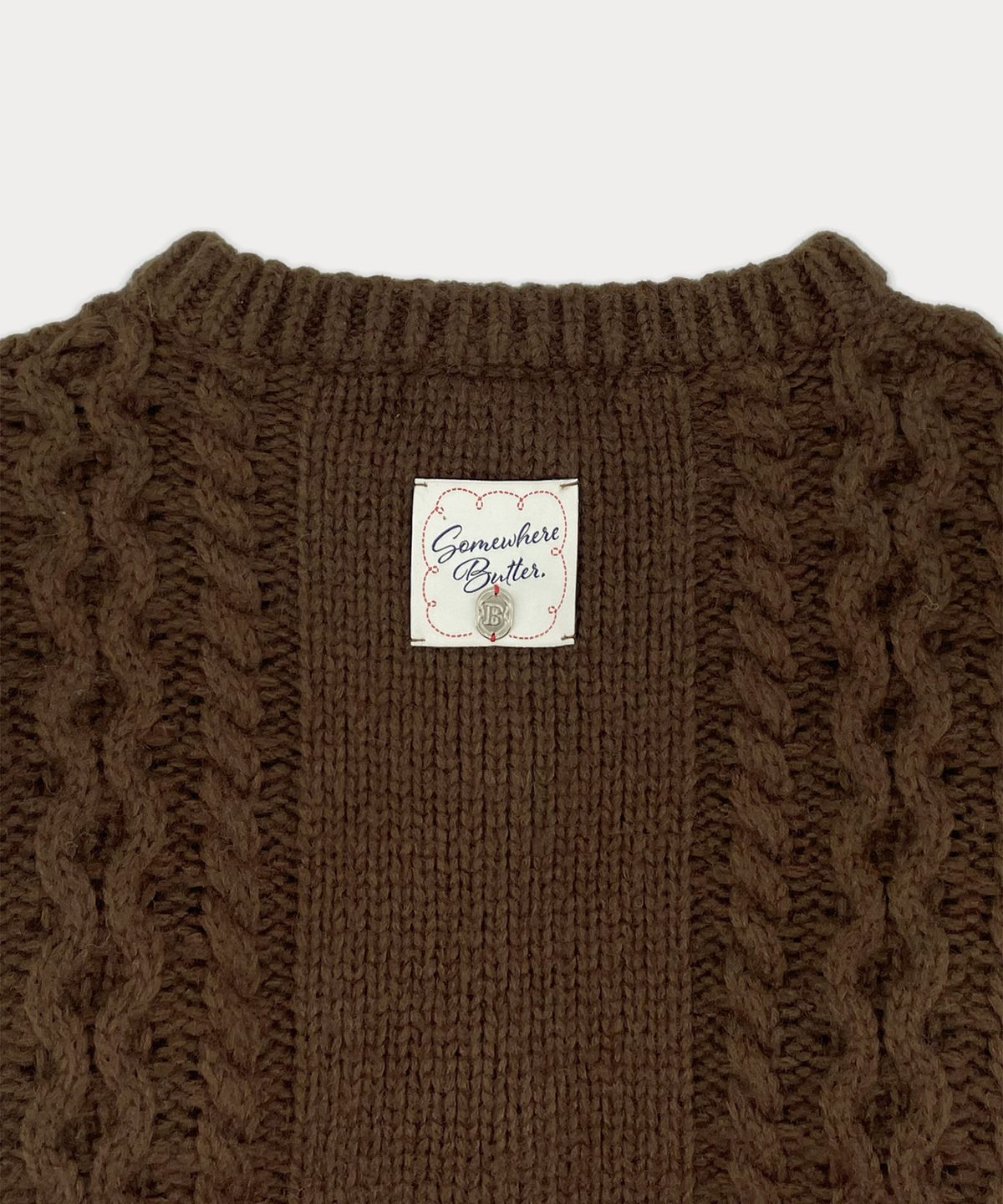 썸웨어버터(SOMEWHEREBUTTER) Woodbutton Cable Cardigan - Brown