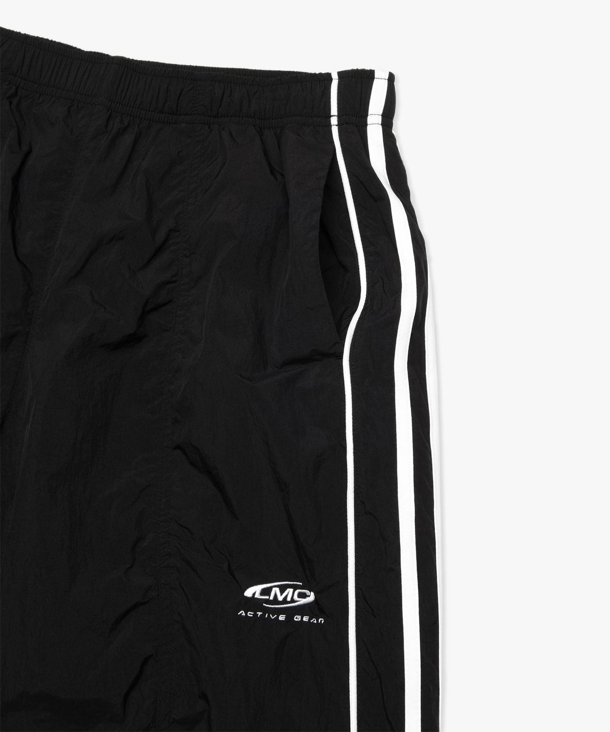 엘엠씨(LMC) PIPING LINE TRACK PANTS black