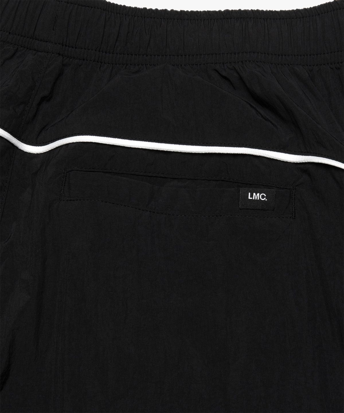 엘엠씨(LMC) PIPING LINE TRACK PANTS black