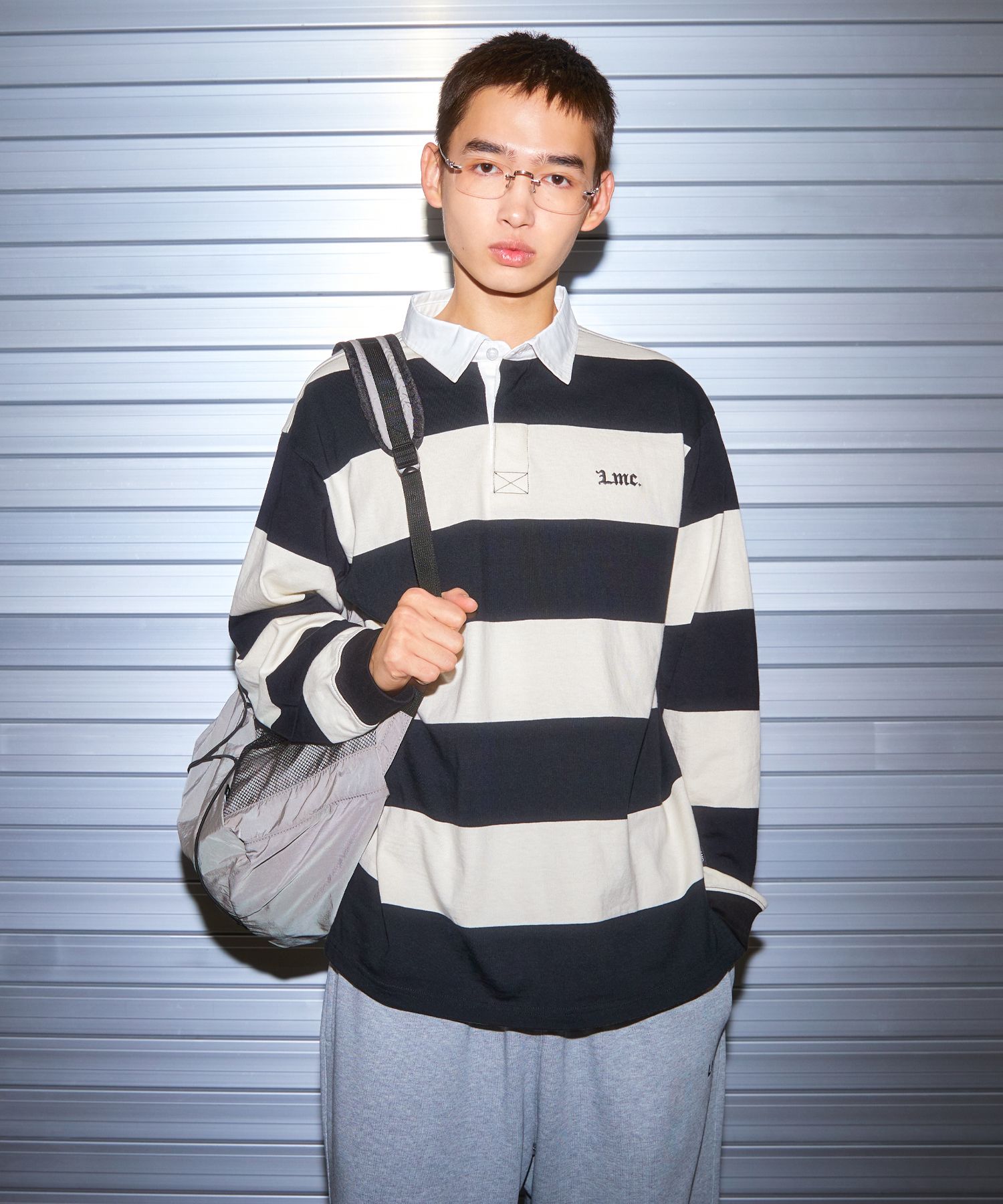 MUSINSA | LMC STRIPE GOTHIC NAME RUGBY SHIRT black