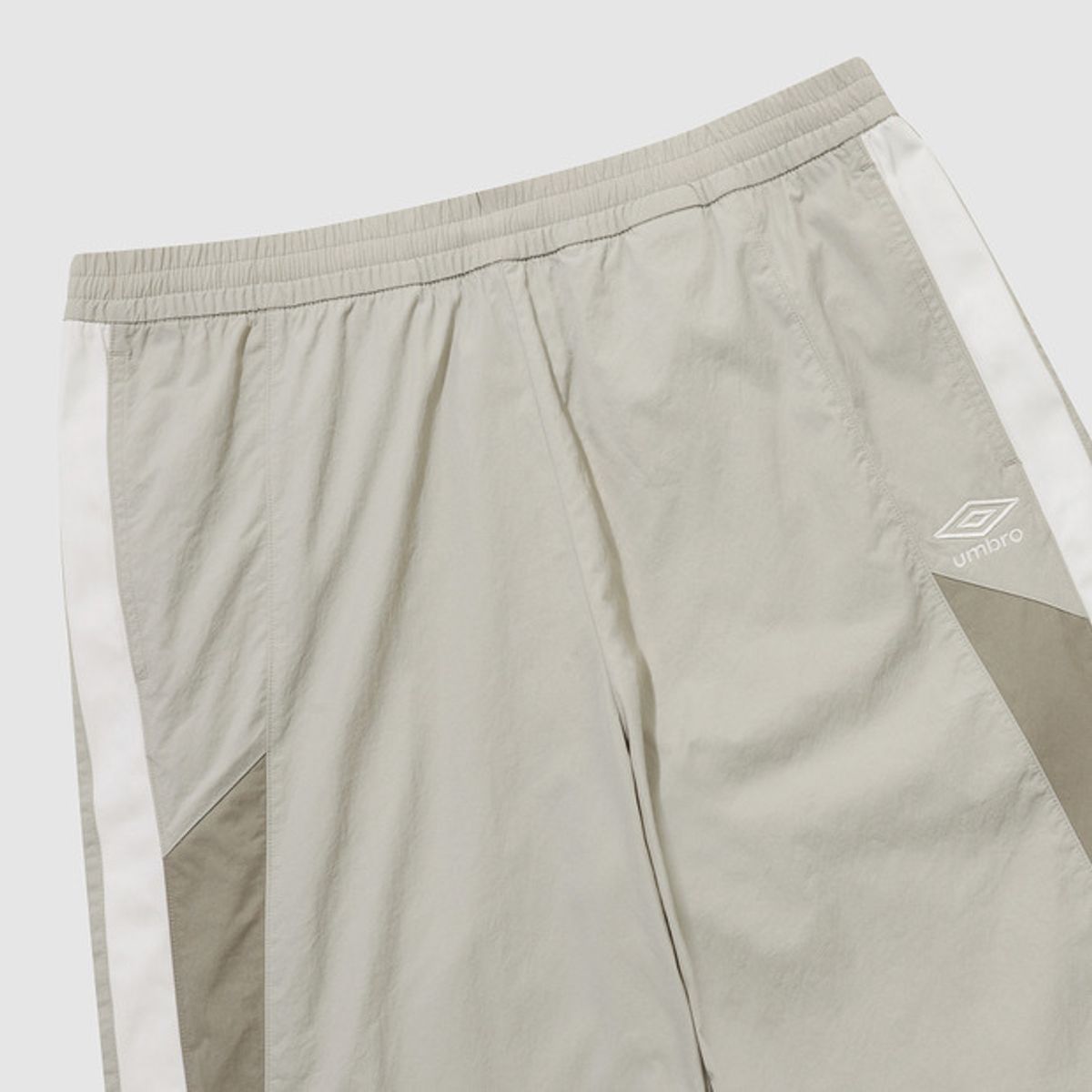 엄브로(UMBRO) 더블데커 스트레이트 & 조거 2WAY 팬츠 베이지(UQ121CPT13)
