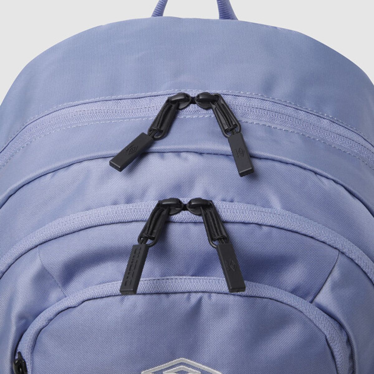 엄브로(UMBRO) 트위스트 베이직 백팩 (23L)_미니 파우치 퍼플(UQ123CBP12)