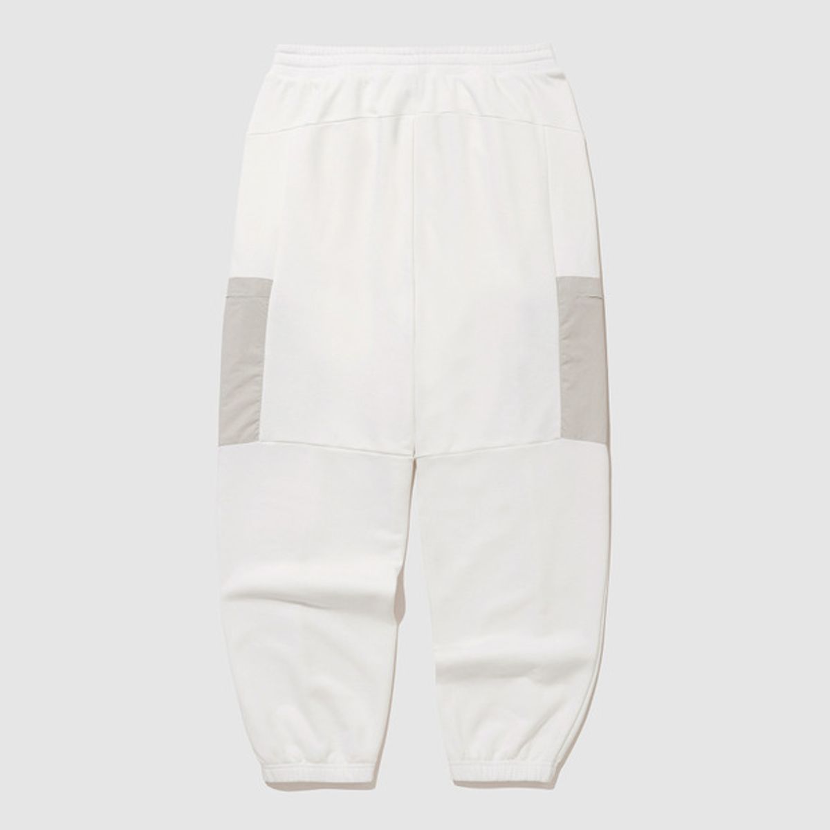 엄브로(UMBRO) 웨이파인더 우븐BIT 니트 조거 팬츠 아이보리(UQ121CFP13)