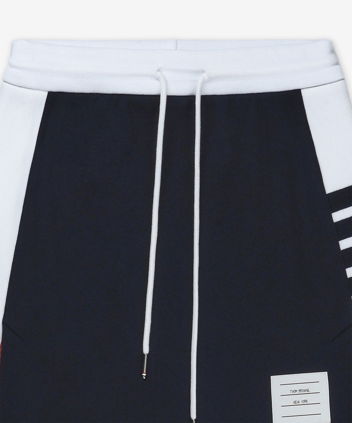 톰 브라운(THOM BROWNE) 클래식 4-바 저지 미니 스커트 - 네이비 / FJK130A03037415