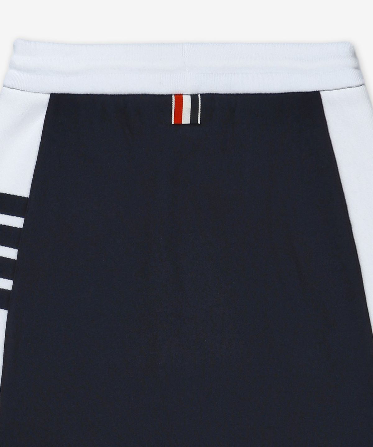 톰 브라운(THOM BROWNE) 클래식 4-바 저지 미니 스커트 - 네이비 / FJK130A03037415
