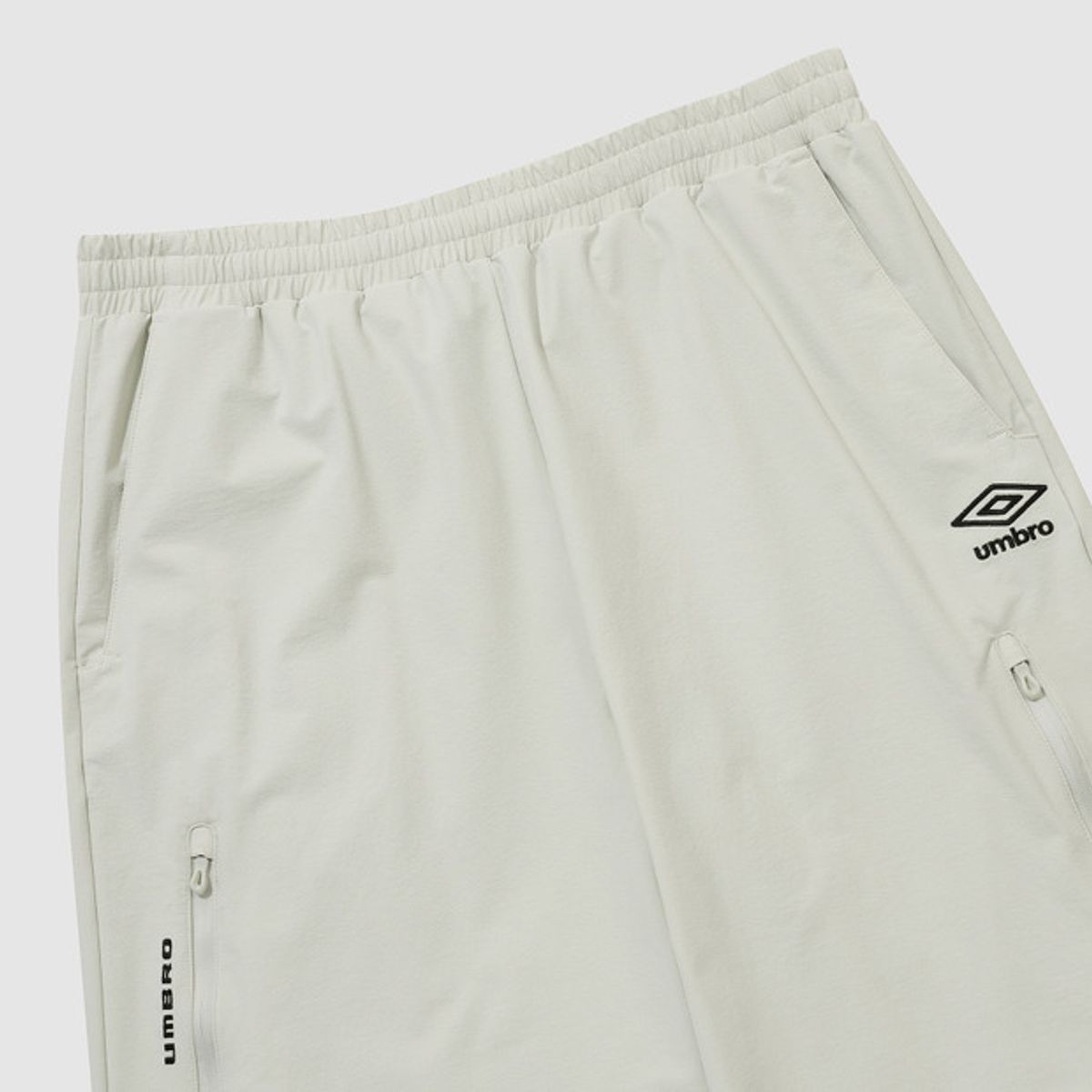 엄브로(UMBRO) 브로텍트 지퍼 카고 스트레이트 팬츠 베이지(UQ121SPT12)