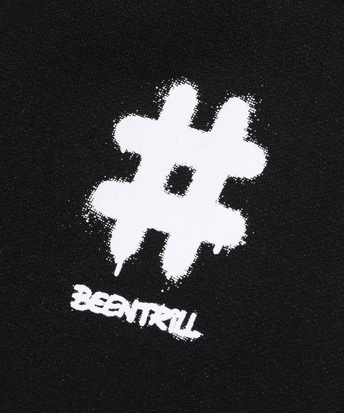 빈트릴(BEENTRILL) 스프레이 해시태그 트레이닝 팬츠(블랙)