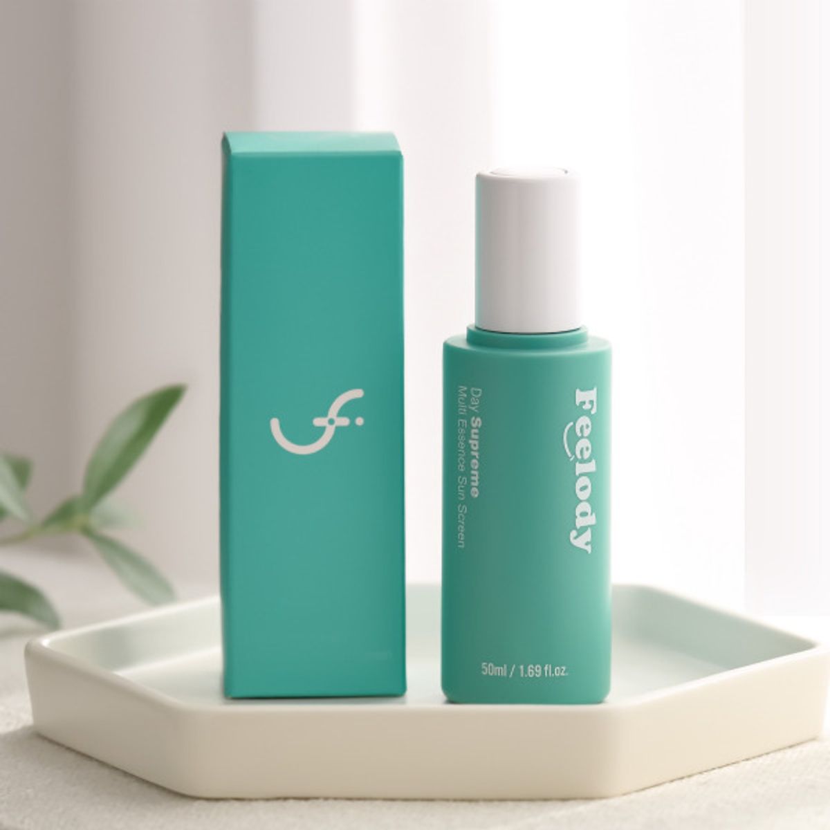 필로디(FEELODY) [선케어+미백]저자극 수분 에센스 선크림 50ml SPF50+ PA++++