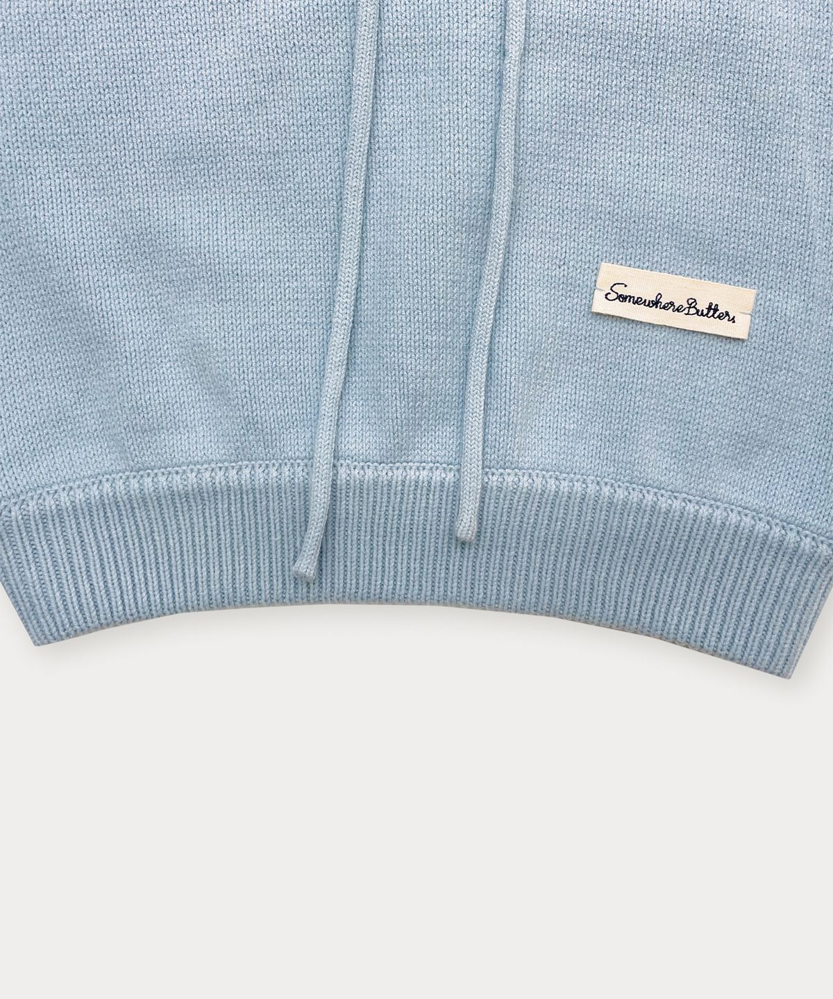 썸웨어버터(SOMEWHEREBUTTER) Hoodie Label Cotton Knit - Light Blue