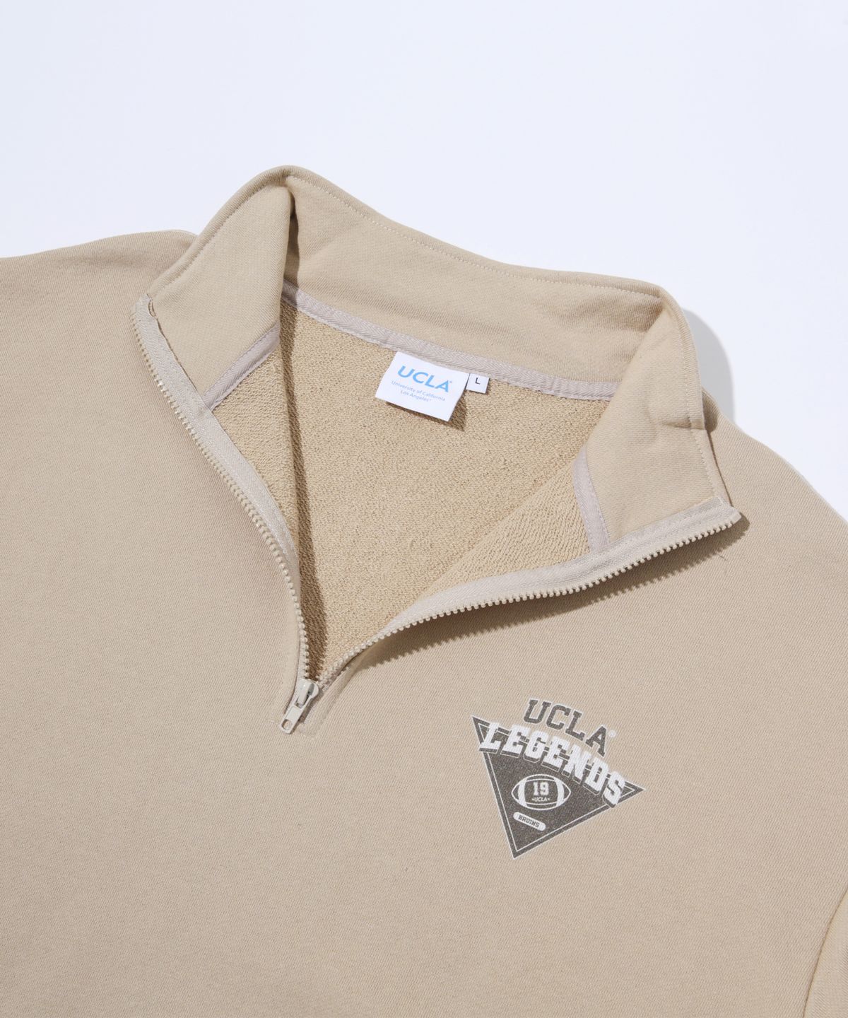 유씨엘에이(UCLA) UCLA 빈티지 스몰로고 반집업[BEIGE](UZ2LTEF)